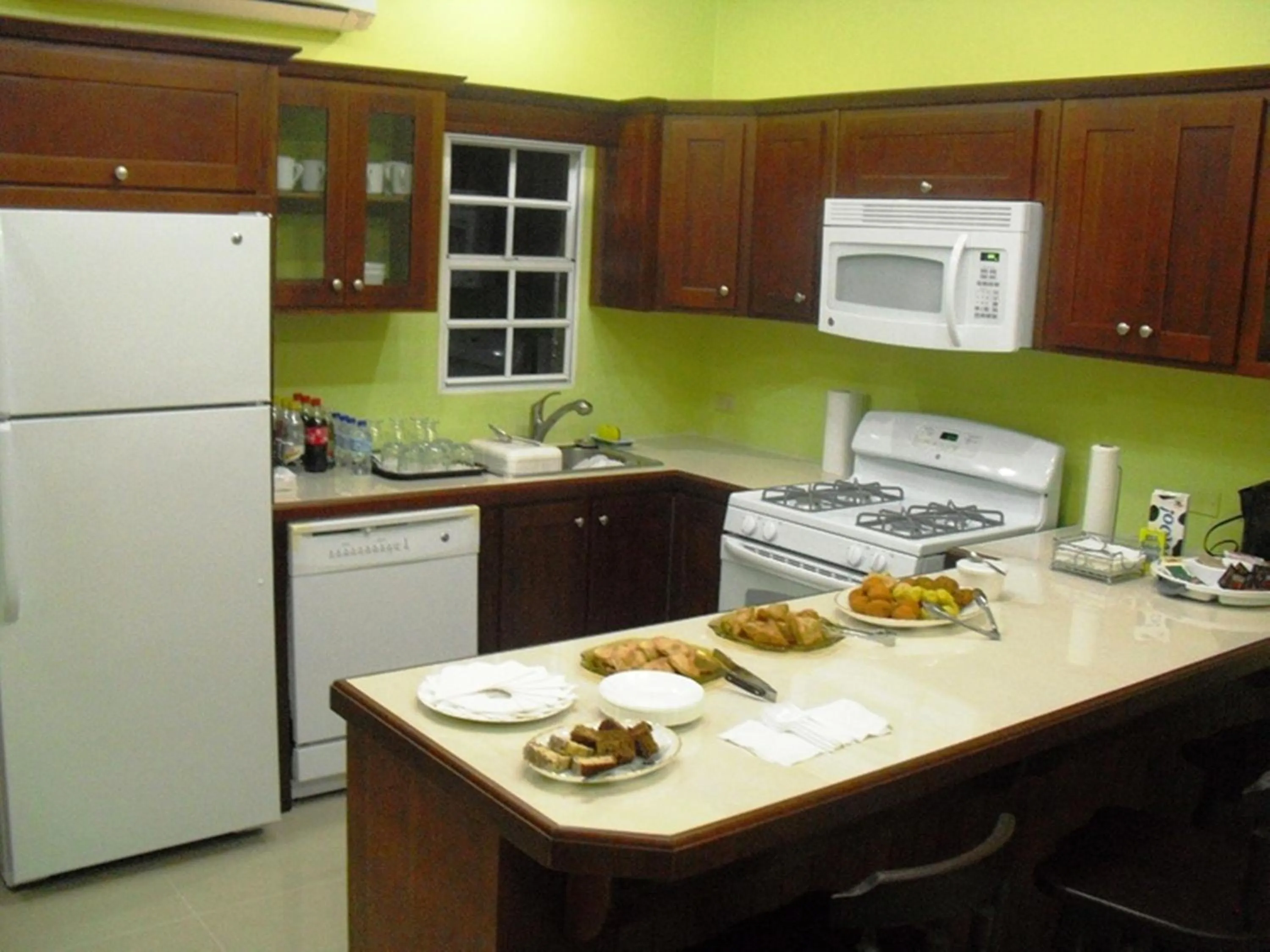 Kitchen or kitchenette in Piarco Village Suites