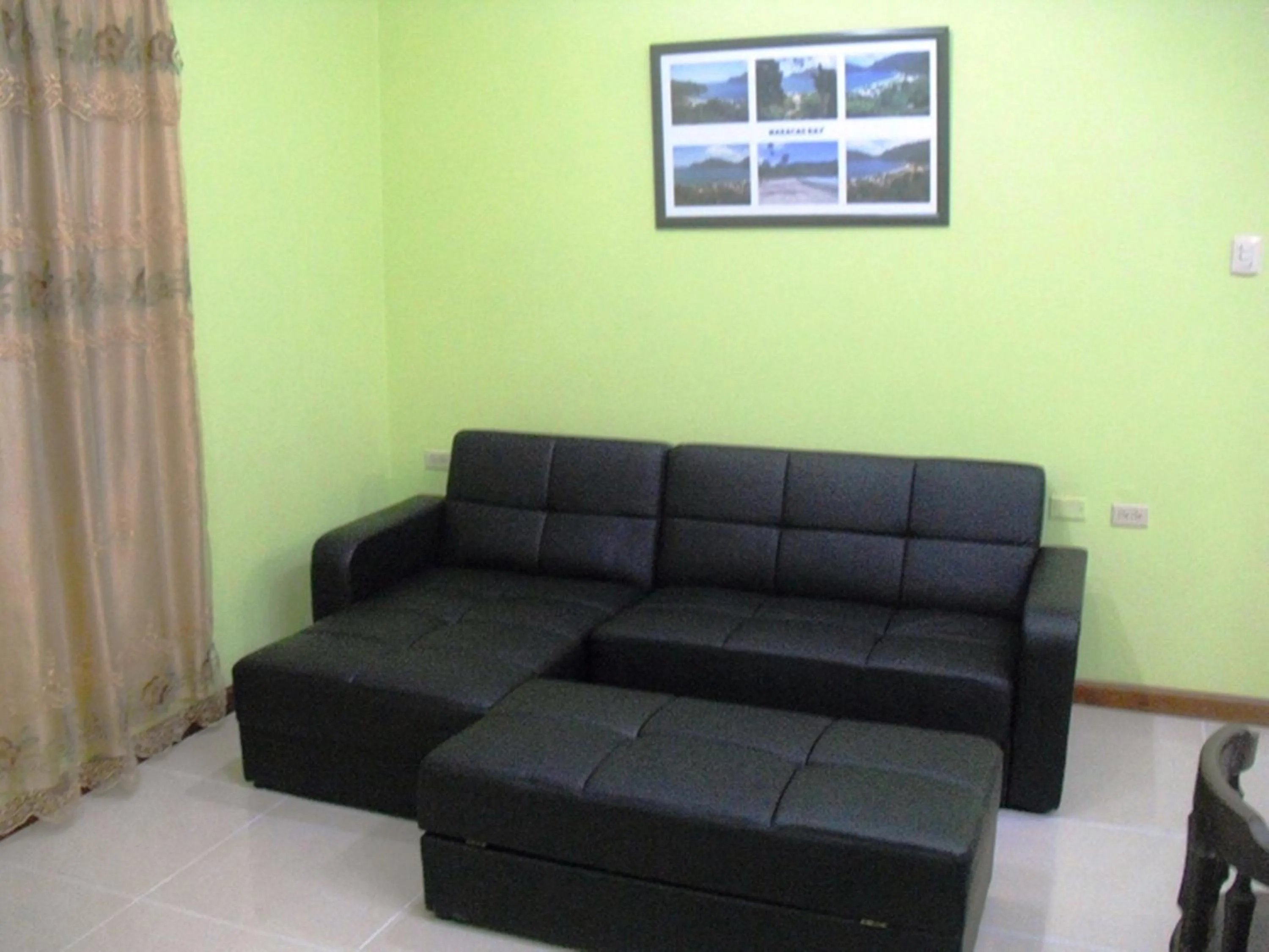 Living room in Piarco Village Suites