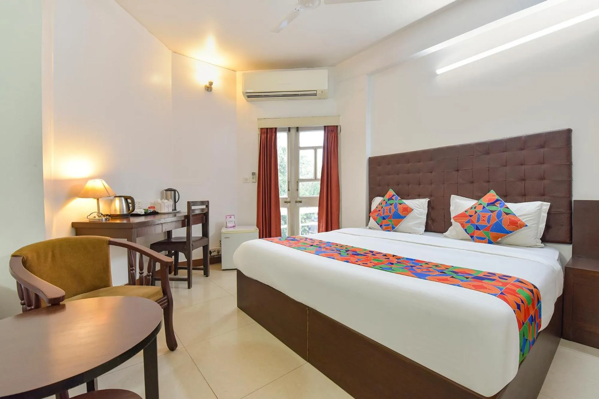 Bed in FabHotel Shikha