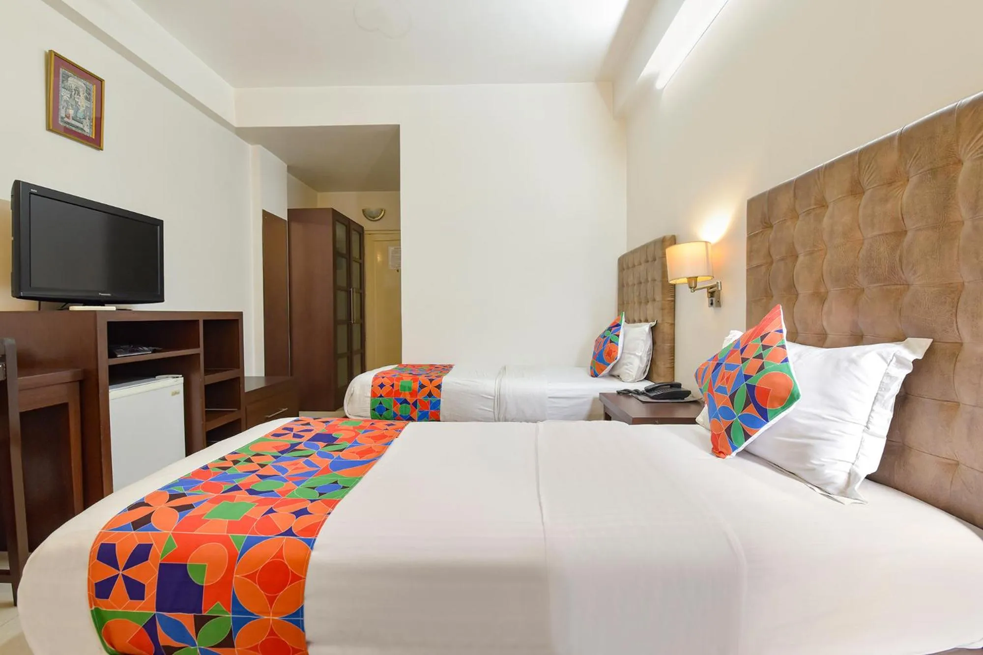 Bed in FabHotel Shikha