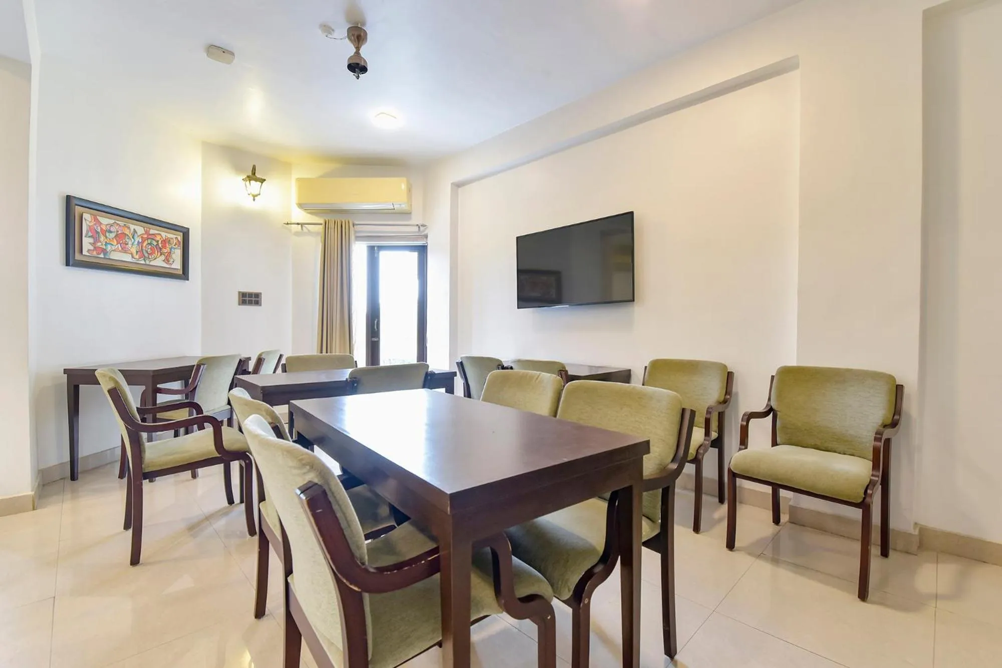 Dining area in FabHotel Shikha
