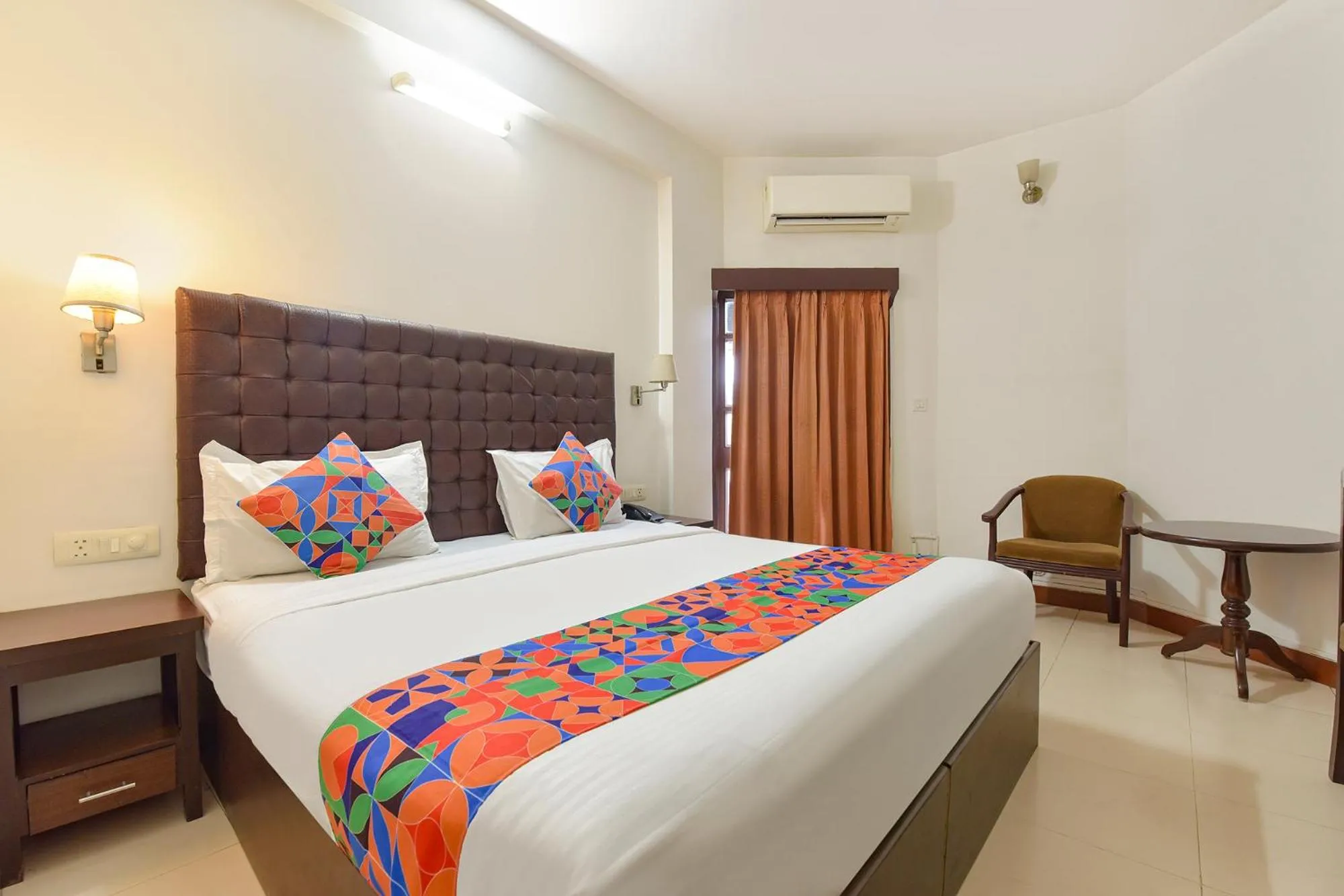 Bed in FabHotel Shikha