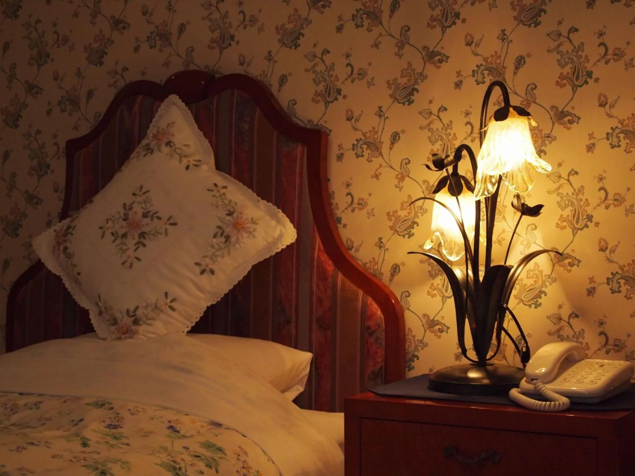 Bed in Petit Hotel Corinthian