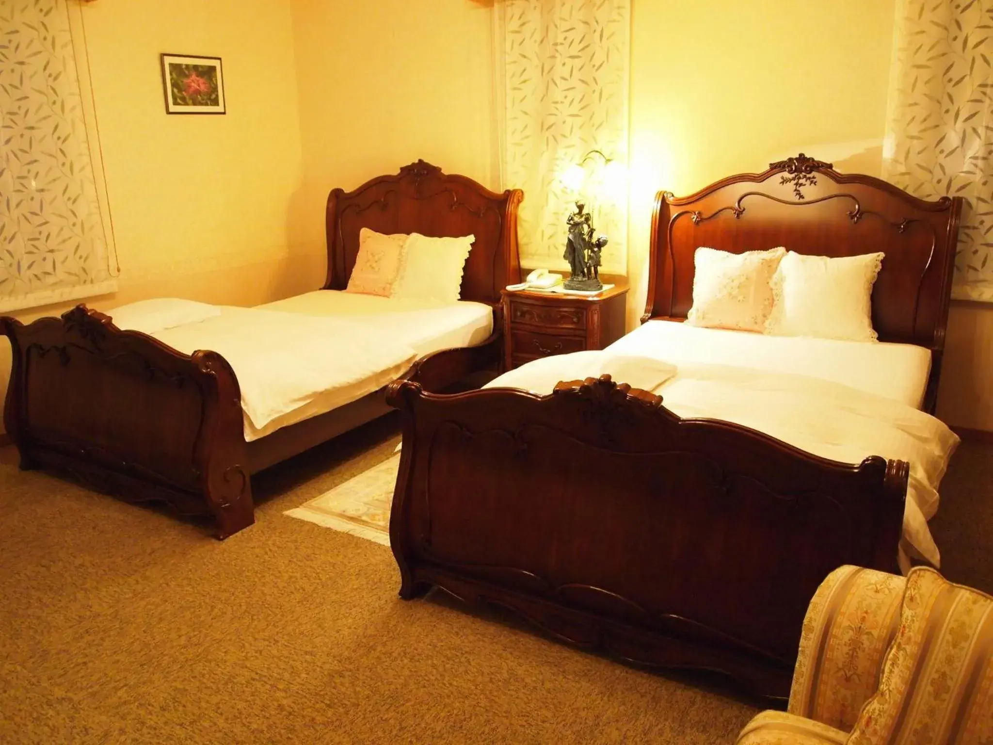 Bed in Petit Hotel Corinthian Bed in Petit Hotel Corinthian