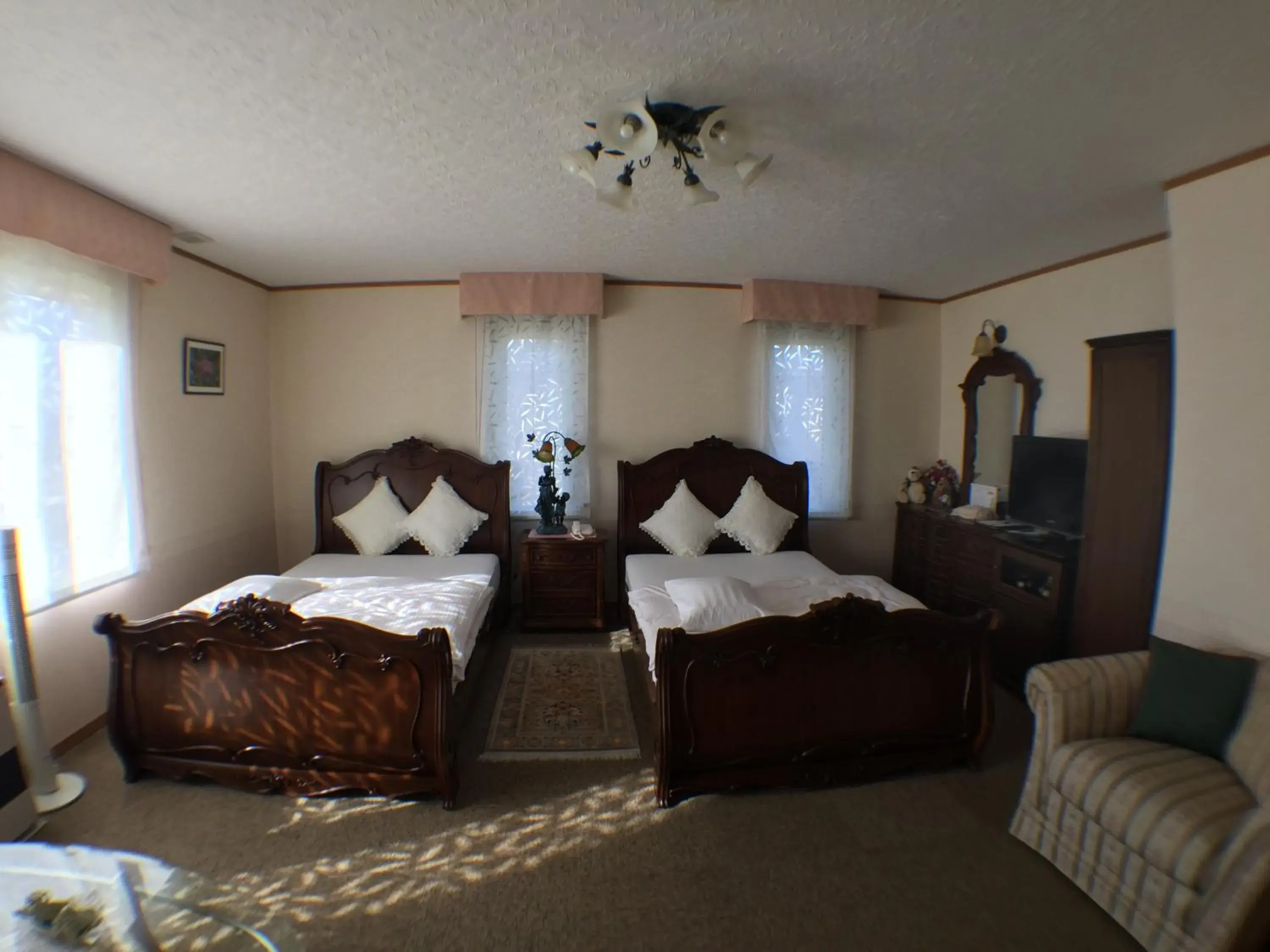 Bedroom in Petit Hotel Corinthian Bedroom in Petit Hotel Corinthian