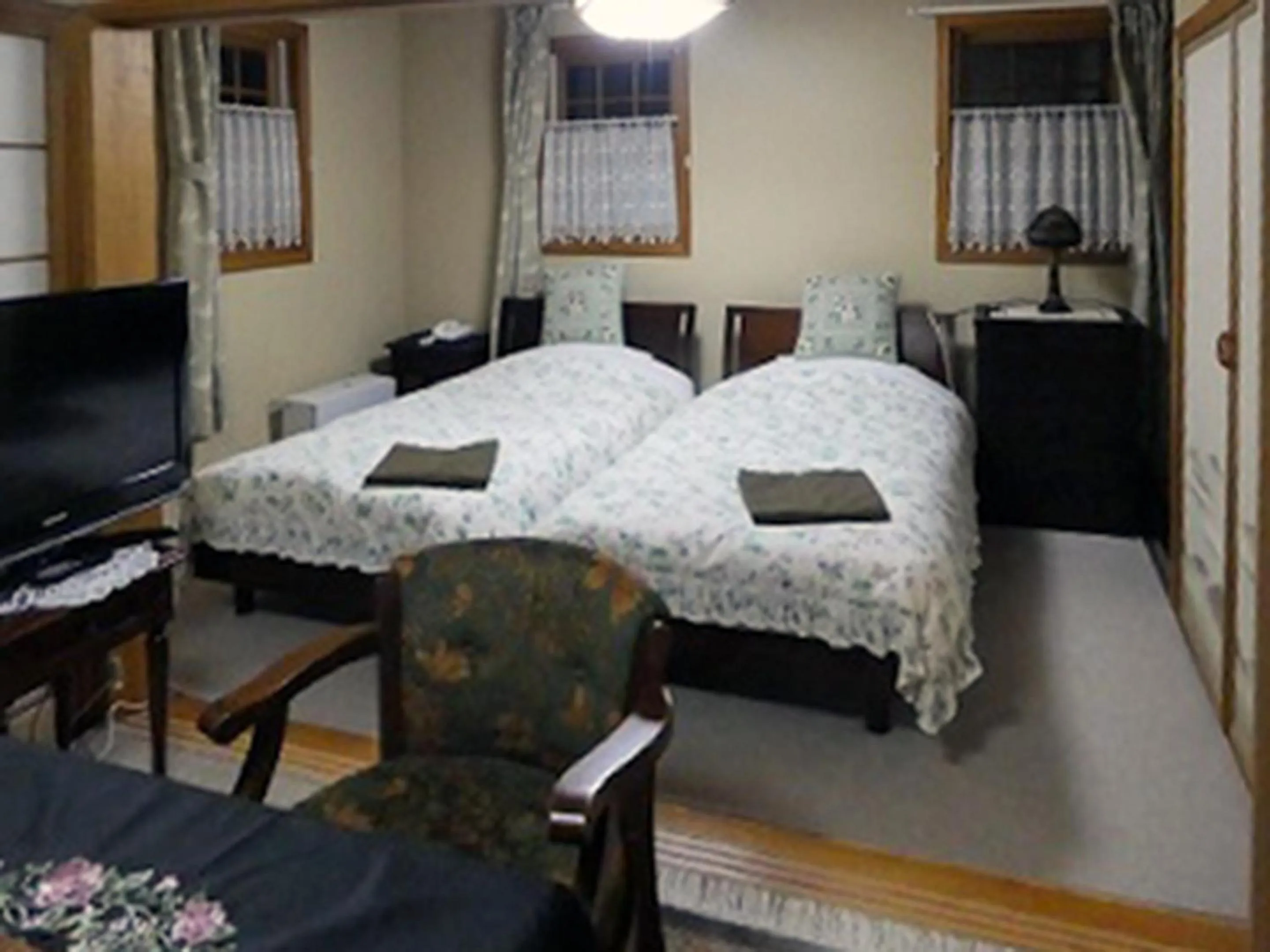 Bed in Petit Hotel Corinthian