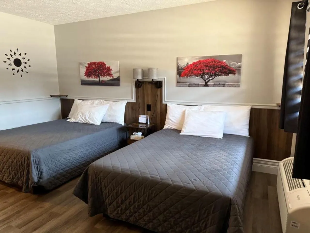 Bed in Auberge MicKy Inc