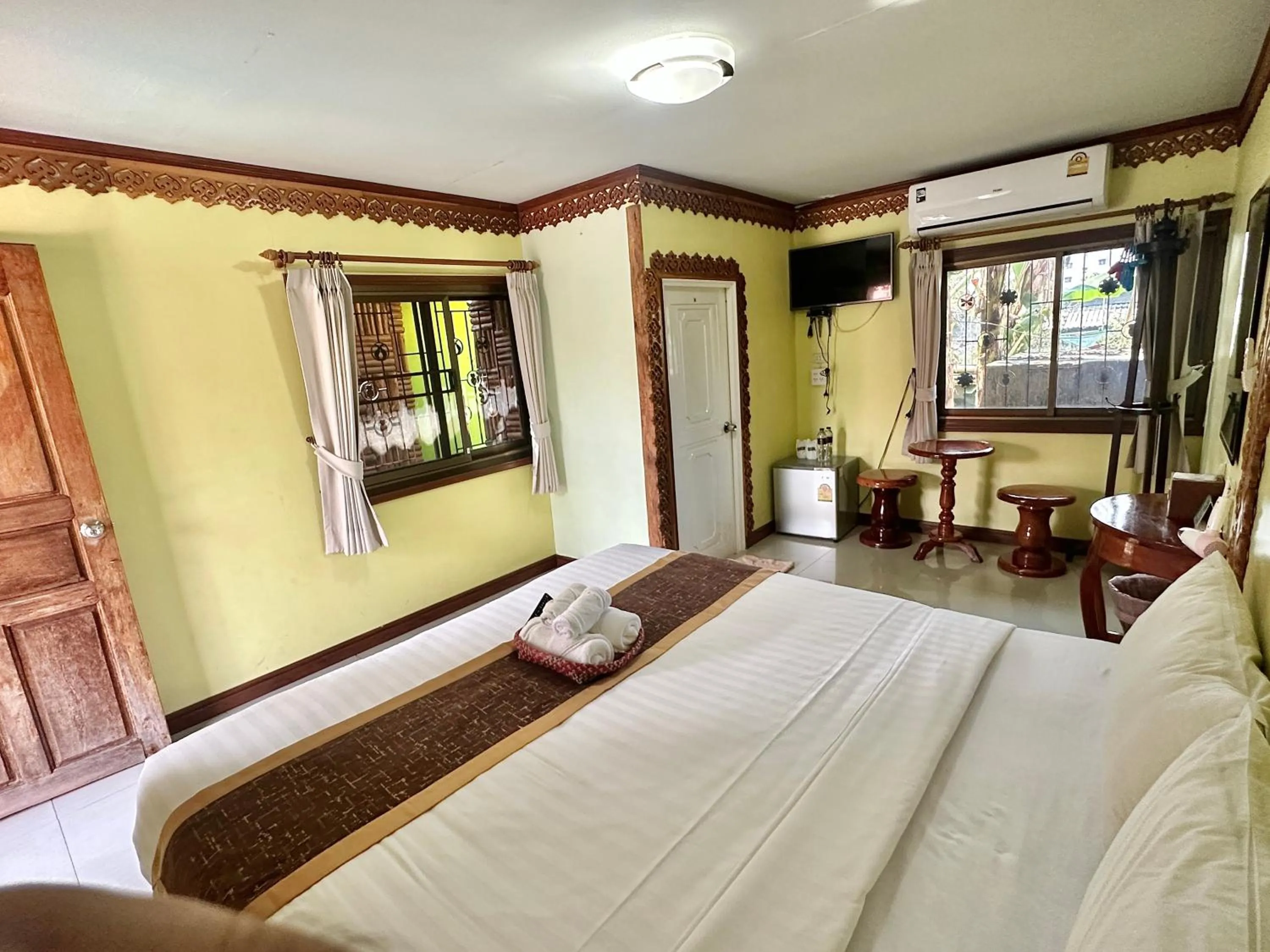 Bed in Montri Resort Donmuang Bangkok