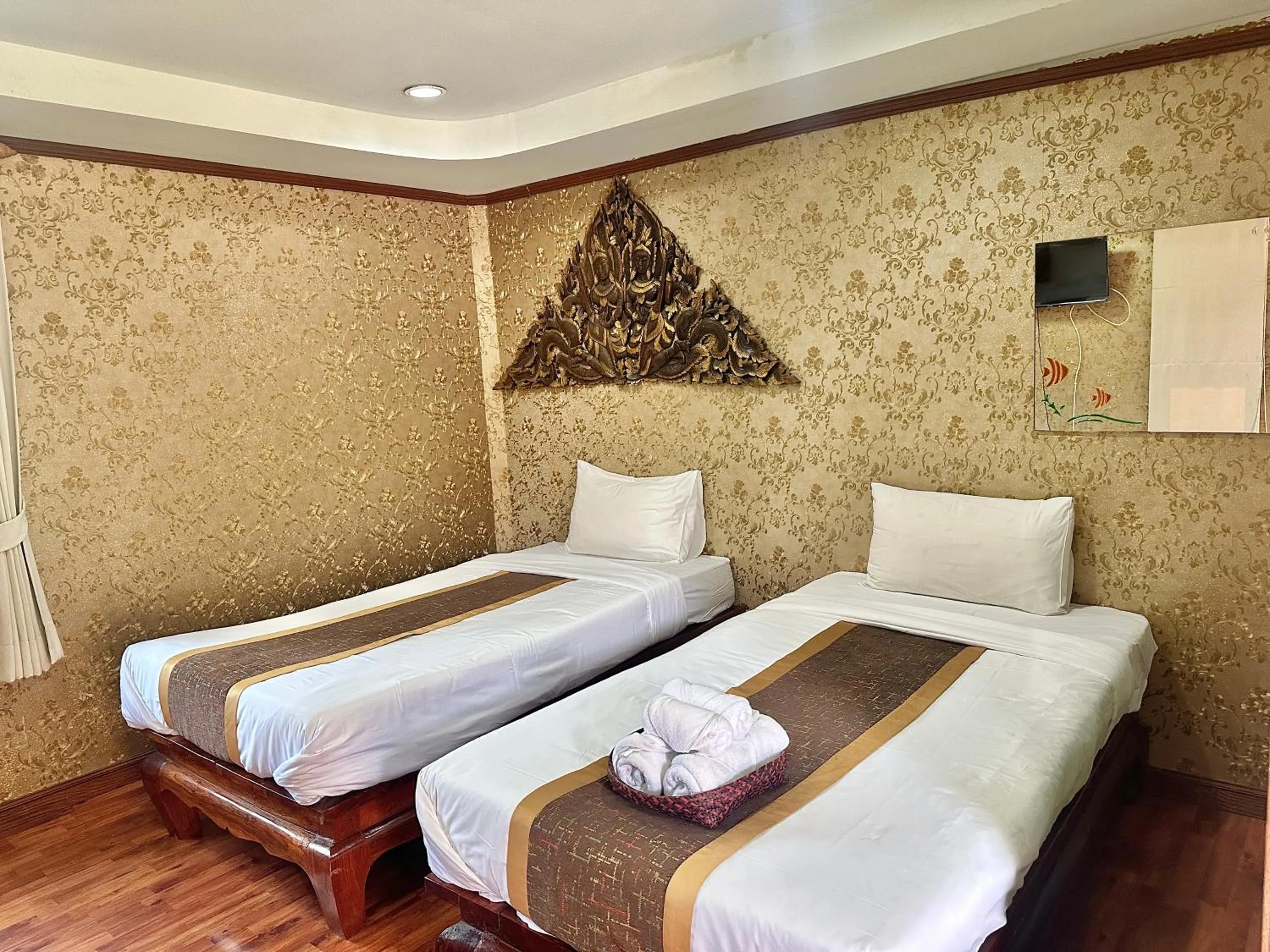 Bed in Montri Resort Donmuang Bangkok