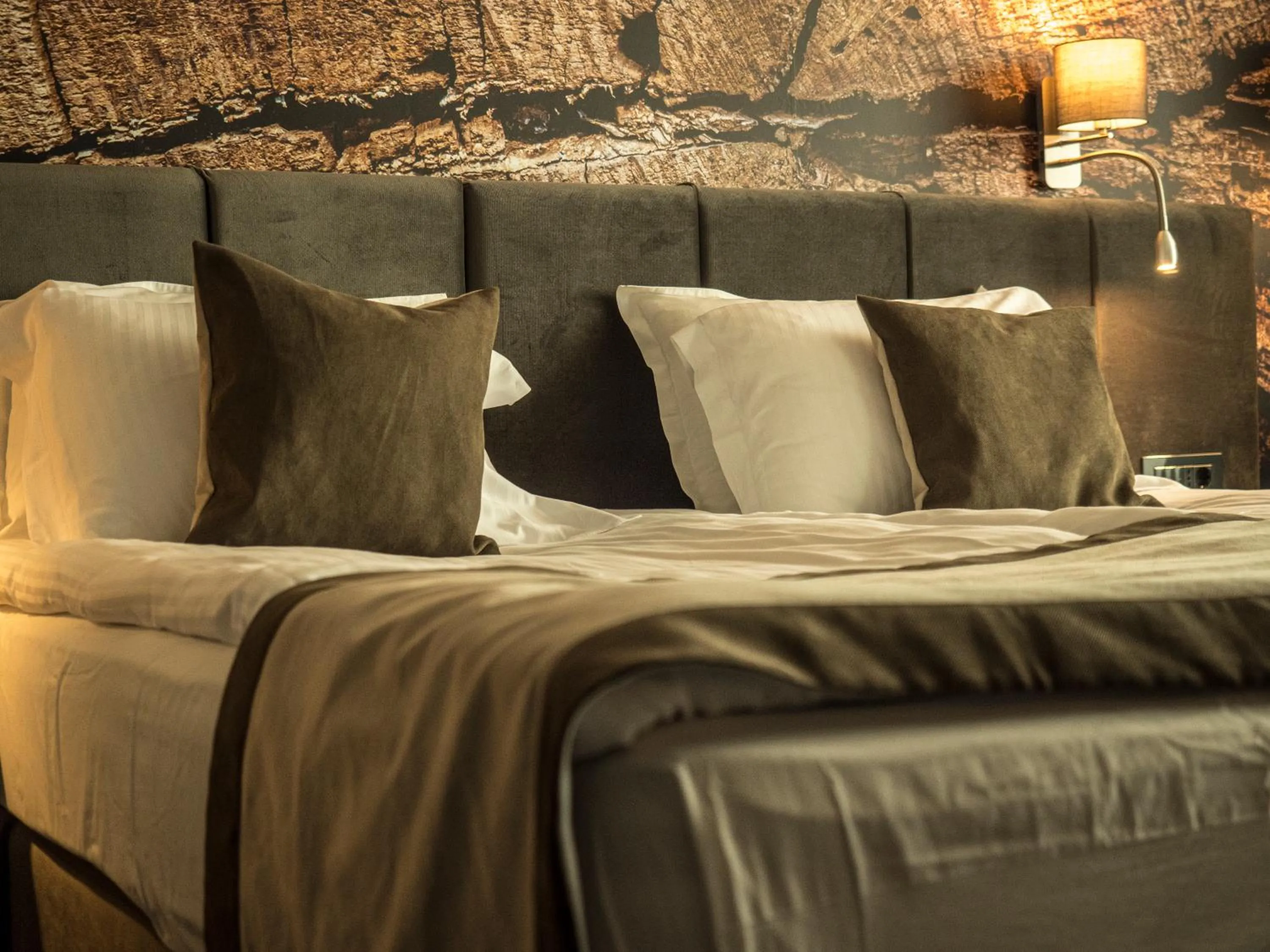 Bed in The Five Elements Hotel and SPA