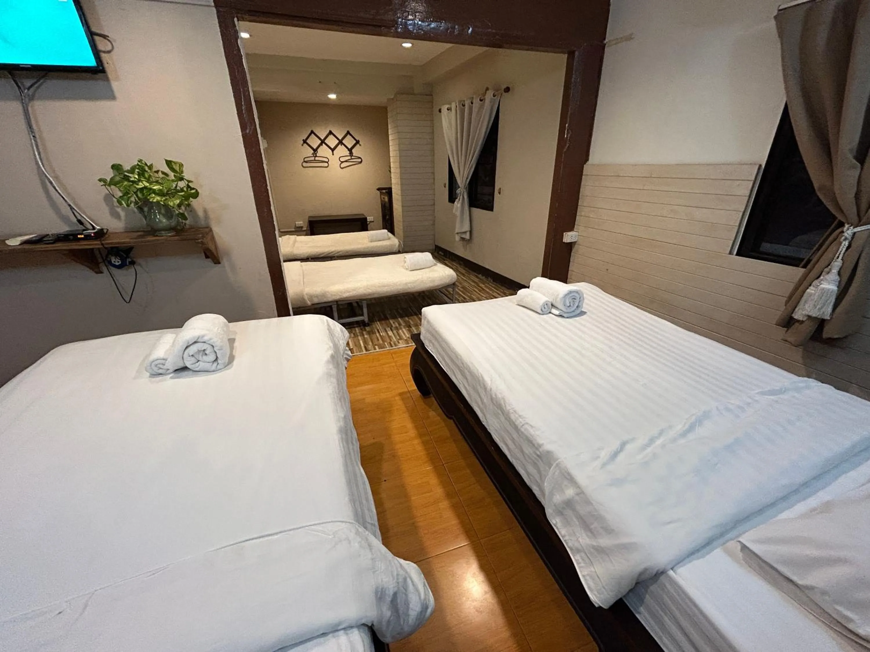 Bed in Kamala's Boutique Guesthouse