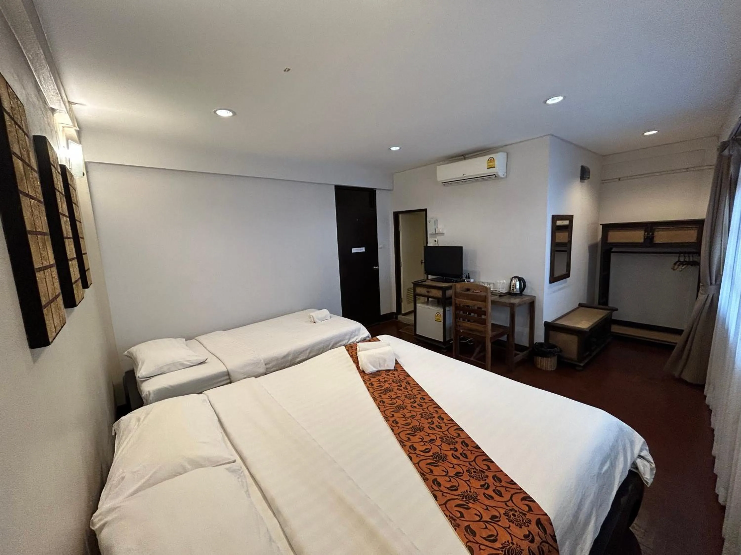 Bed in Kamala's Boutique Guesthouse