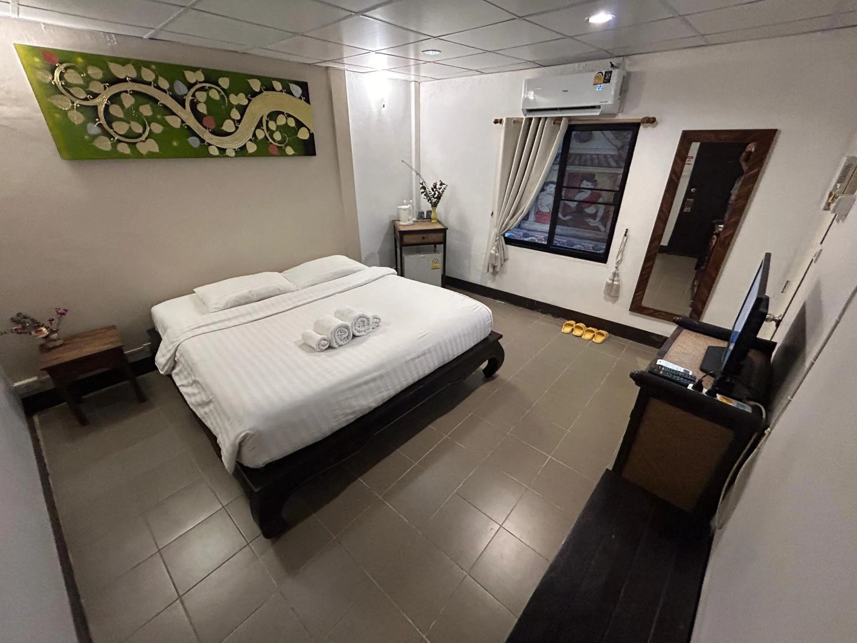 Bed in Kamala's Boutique Guesthouse