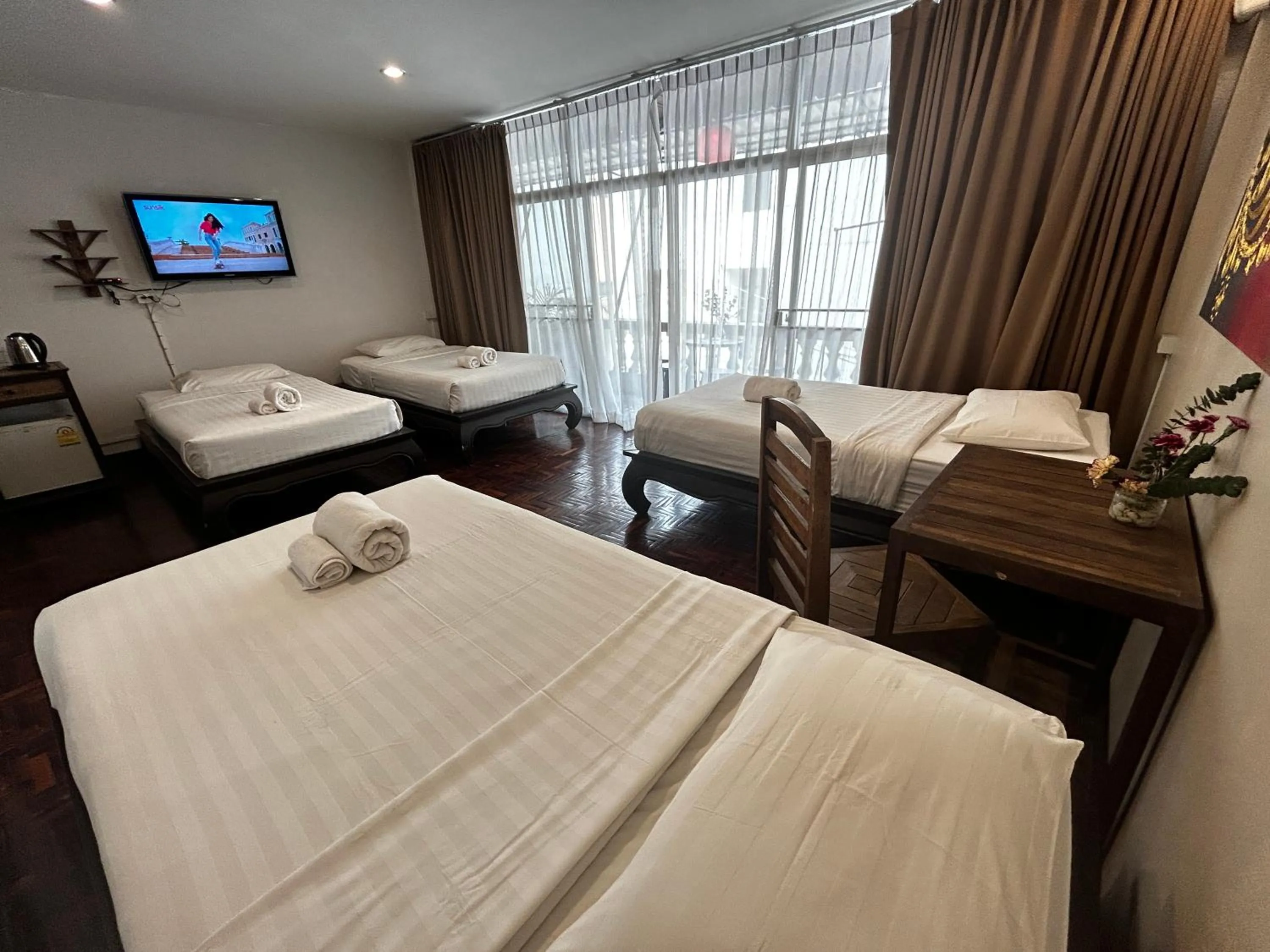 Bed in Kamala's Boutique Guesthouse