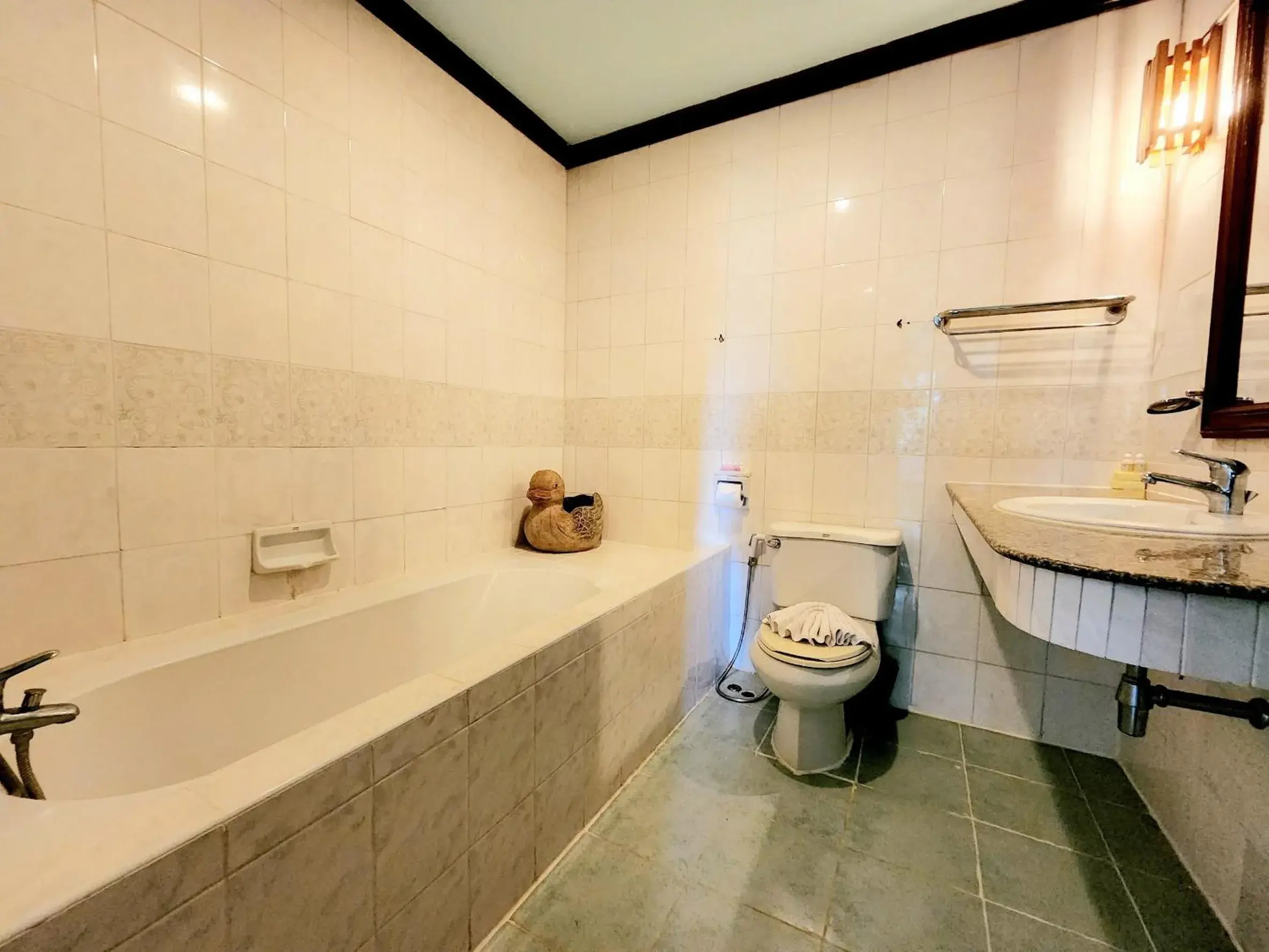 Bathroom in Kata Garden Resort SHA Extra Plus Bathroom in Kata Garden Resort SHA Extra Plus