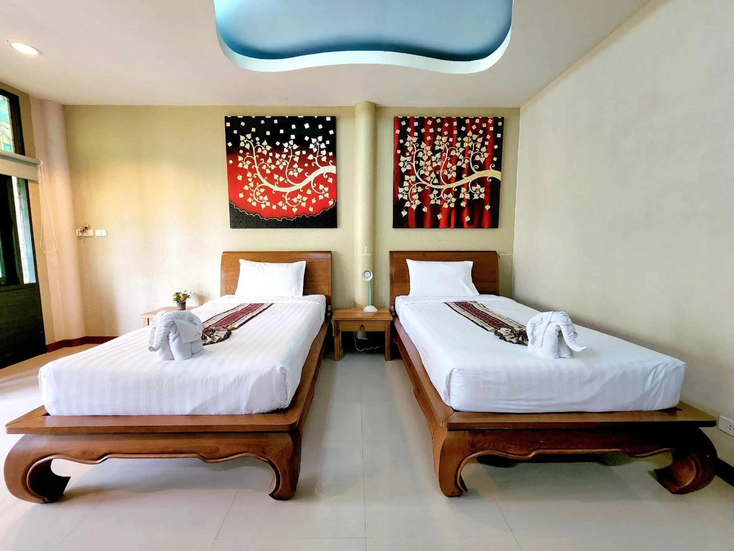 Bed in Kata Garden Resort SHA Extra Plus