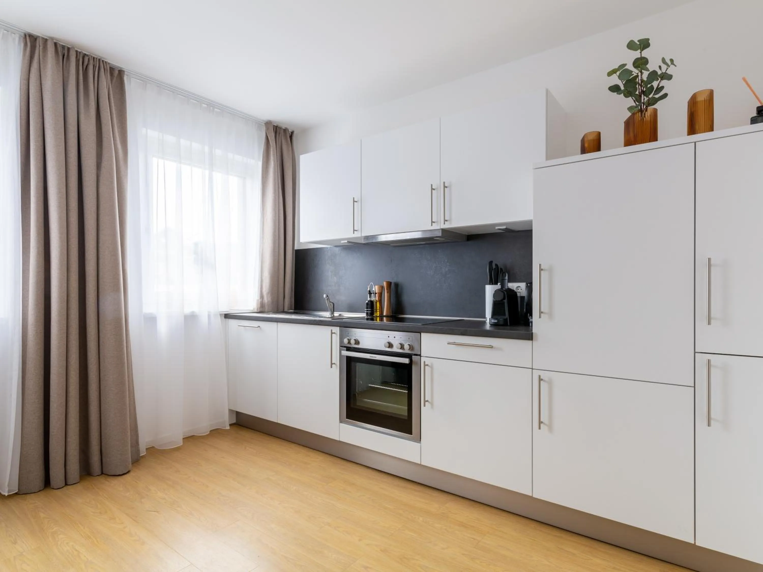 Kitchen or kitchenette in Limehome Passau Bahnhofstraße
