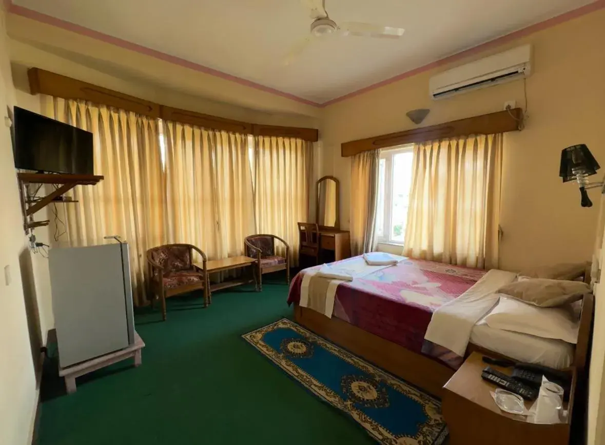 Bed in Green Tara Hotel Bed in Green Tara Hotel