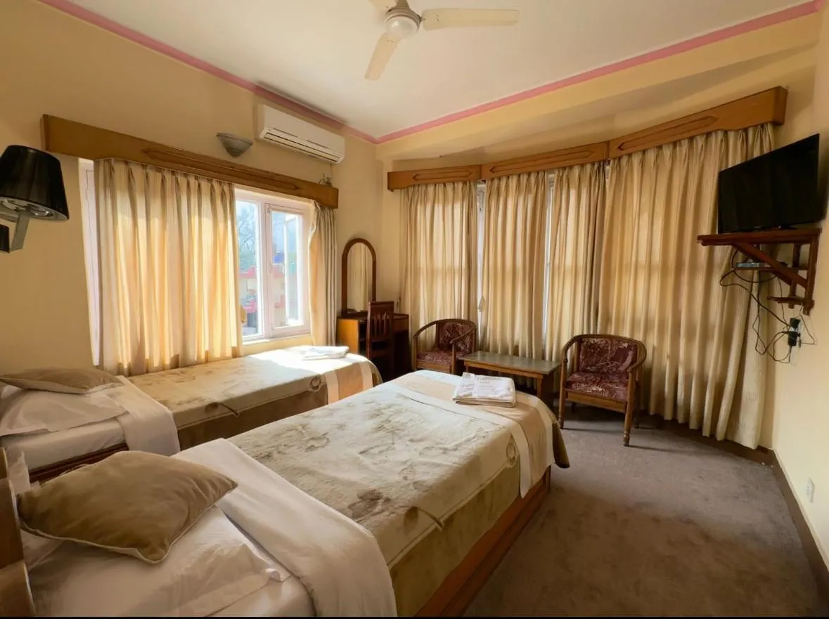 Bed in Green Tara Hotel