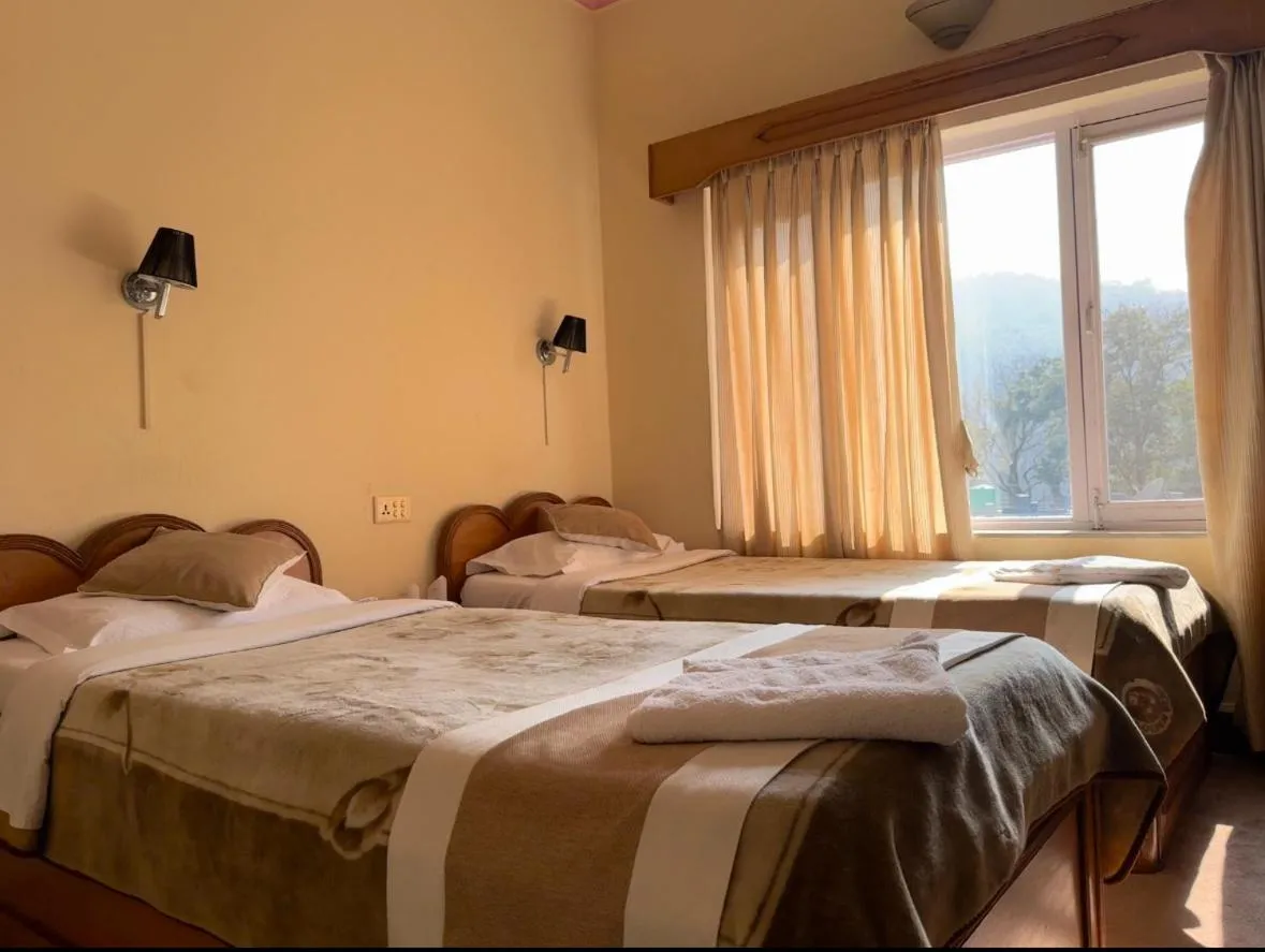 Bed in Green Tara Hotel