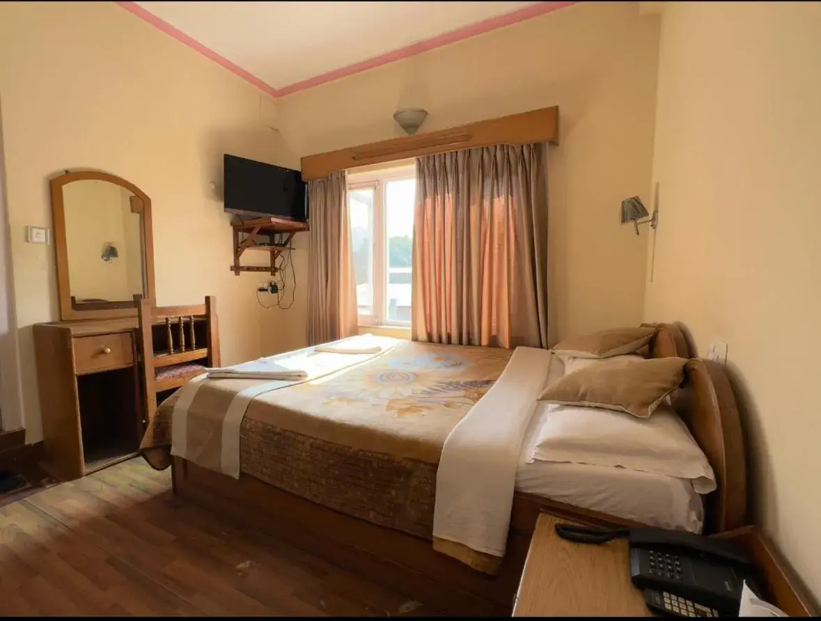 Bed in Green Tara Hotel Bed in Green Tara Hotel