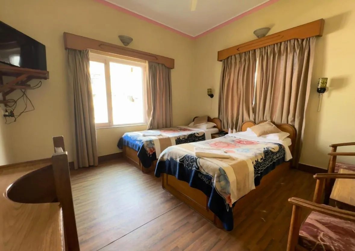 Bed in Green Tara Hotel