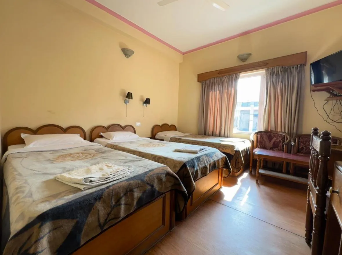 Bed in Green Tara Hotel