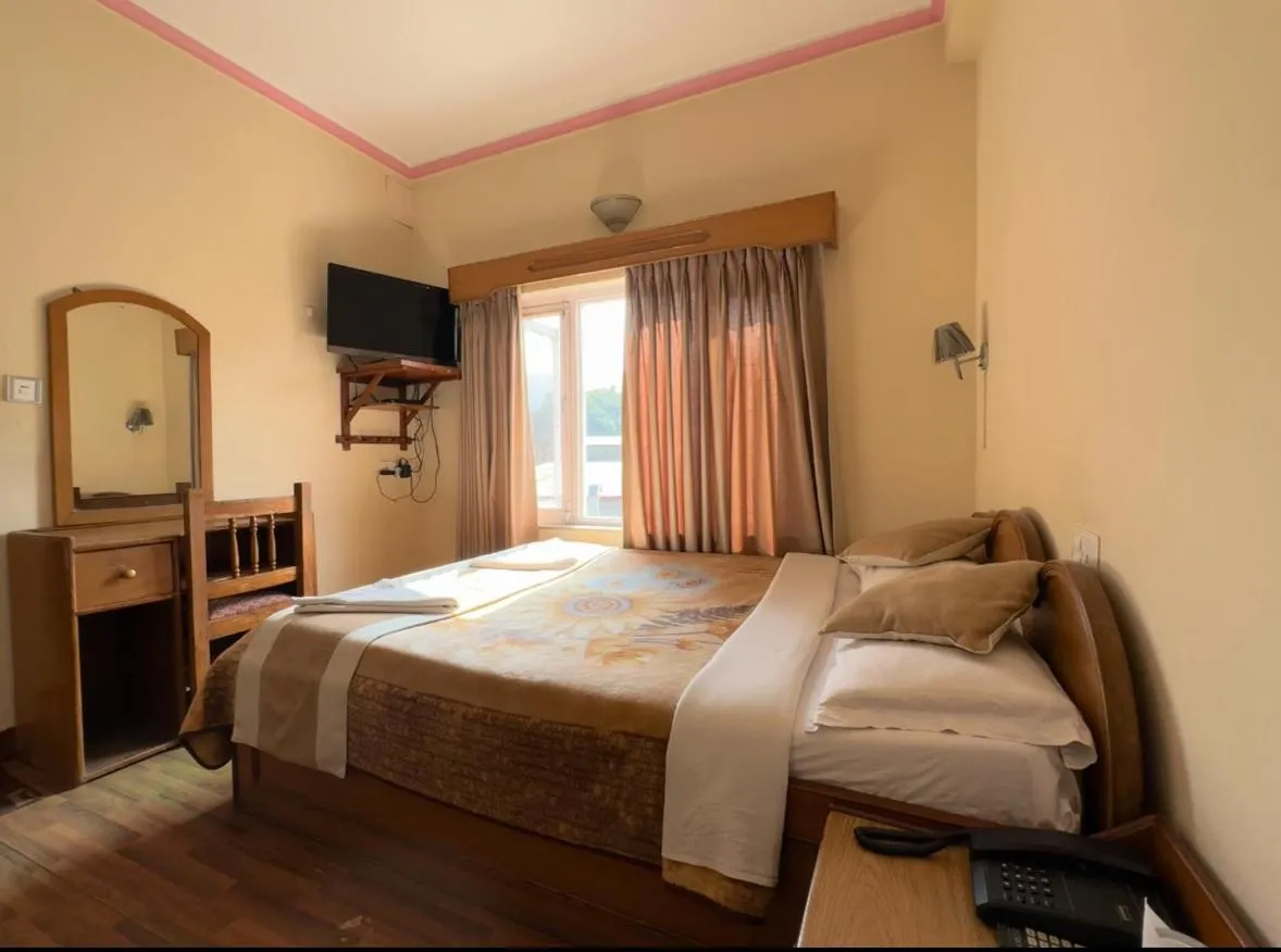 Bed in Green Tara Hotel