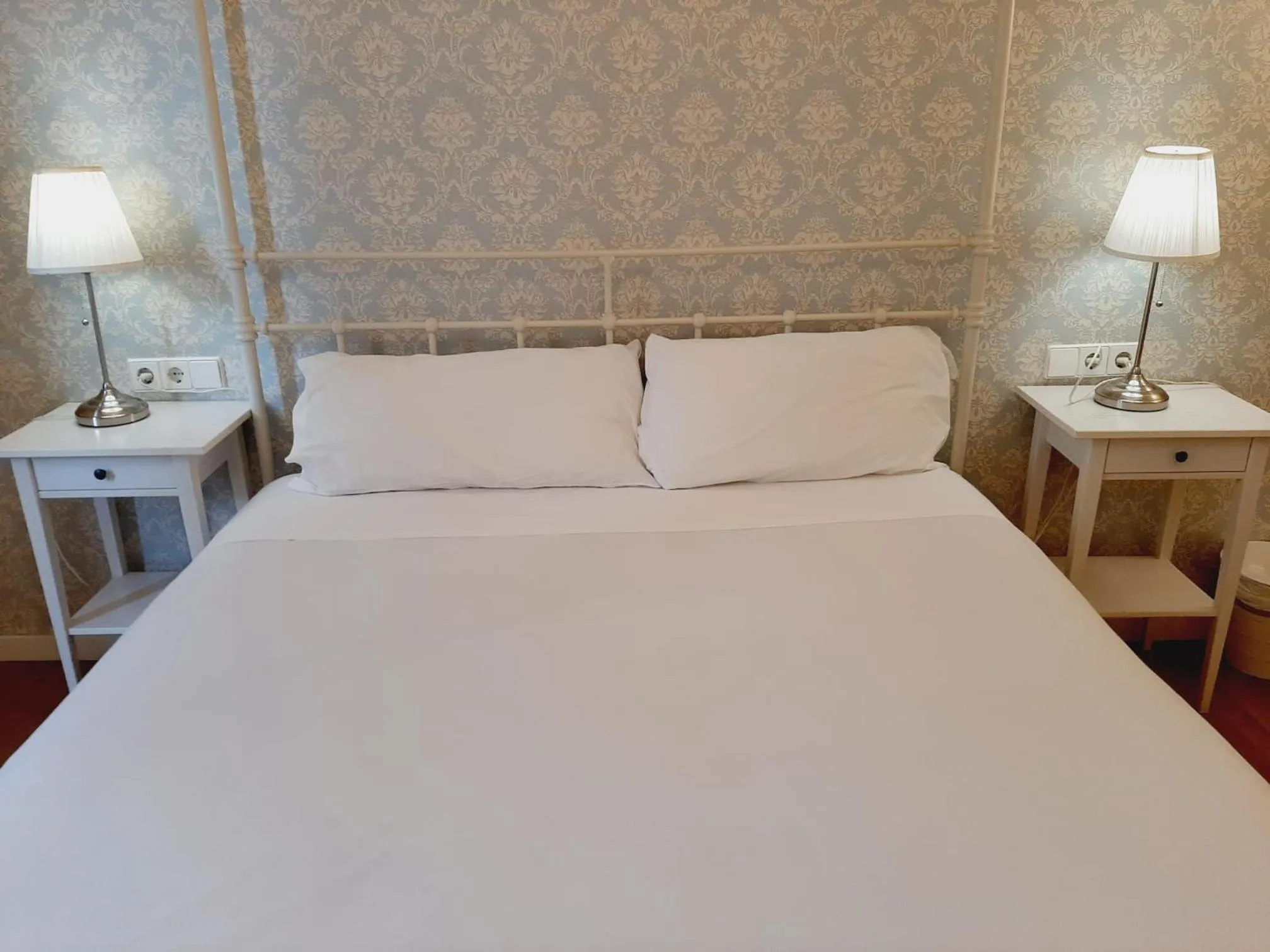 Bed in Lumine Luxury Suites by gaiarooms