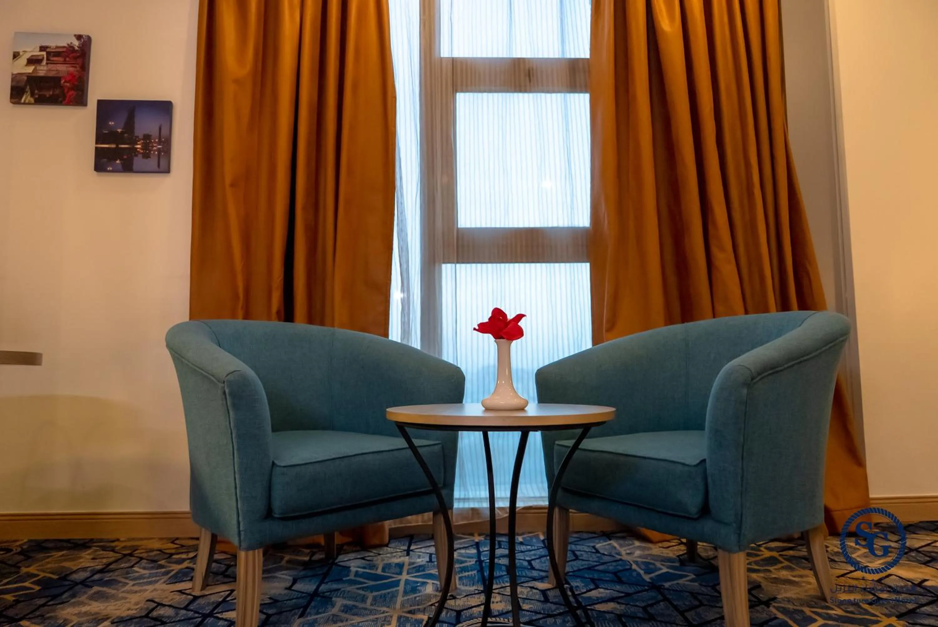 Seating area in Signature Guest Hotel فندق إمضاء النزيل الفندقية