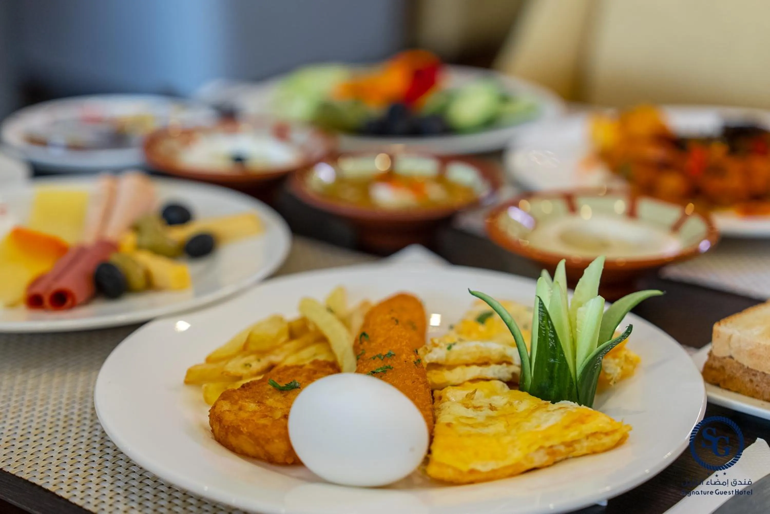 Buffet breakfast in Signature Guest Hotel فندق إمضاء النزيل الفندقية
