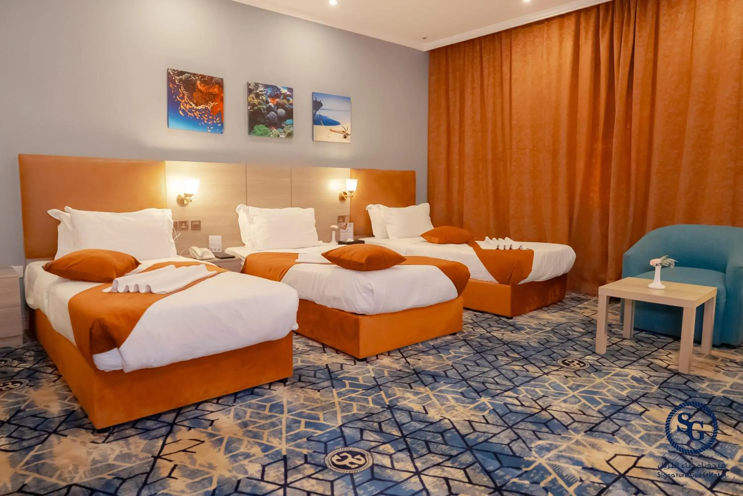 Bed in Signature Guest Hotel فندق إمضاء النزيل الفندقية Bed in Signature Guest Hotel فندق إمضاء النزيل الفندقية