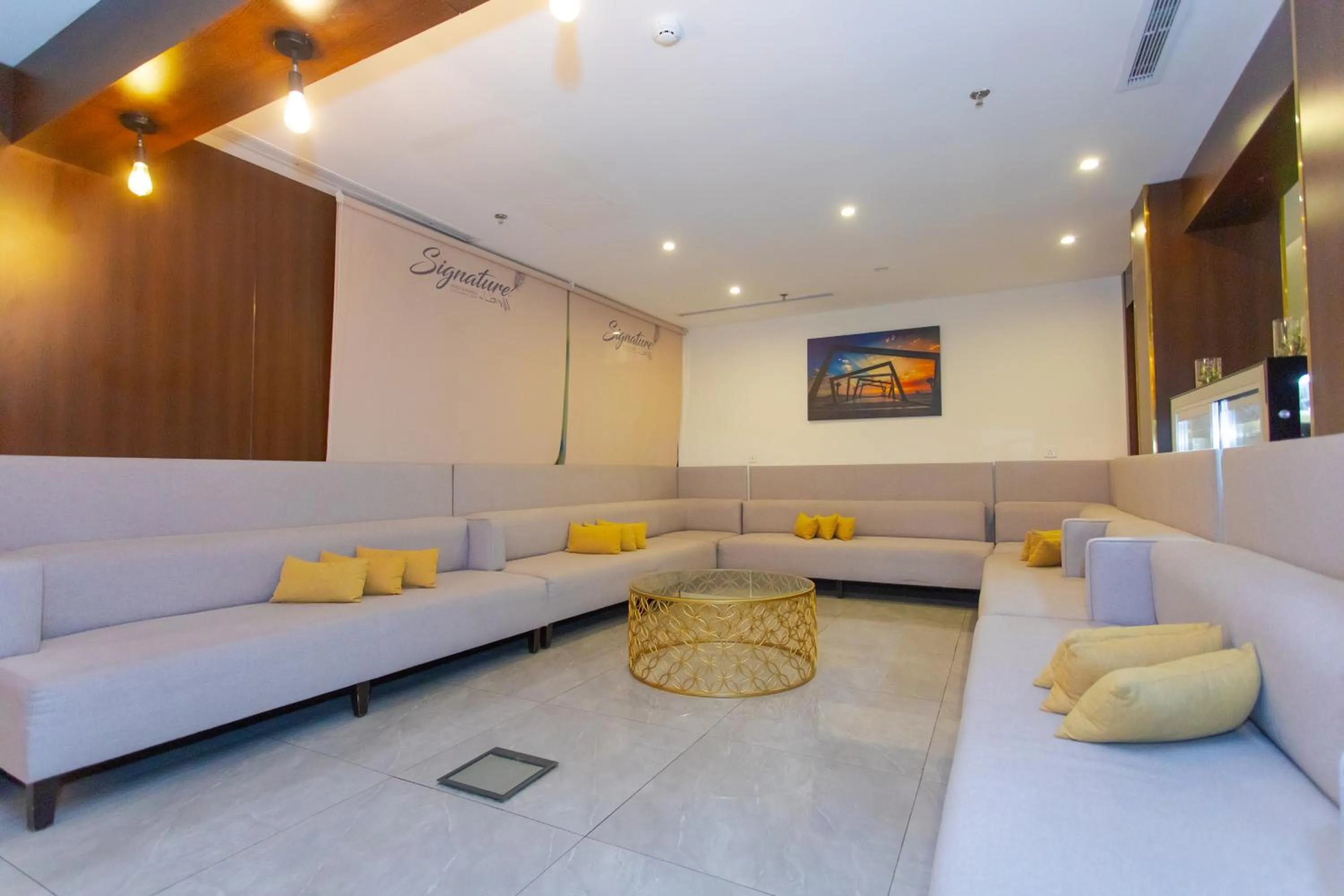 Seating area in Signature Guest Hotel فندق إمضاء النزيل الفندقية