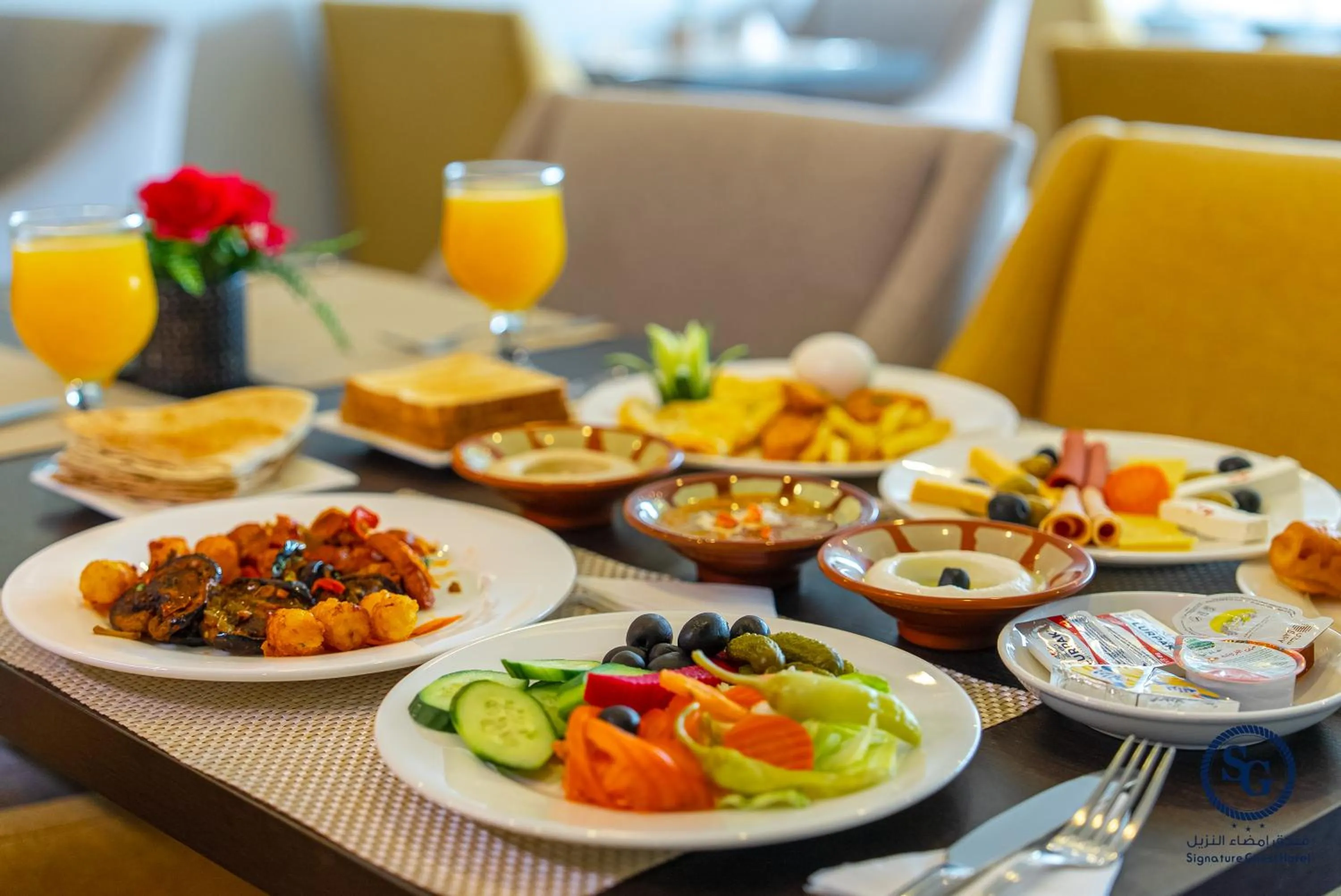 Breakfast in Signature Guest Hotel فندق إمضاء النزيل الفندقية