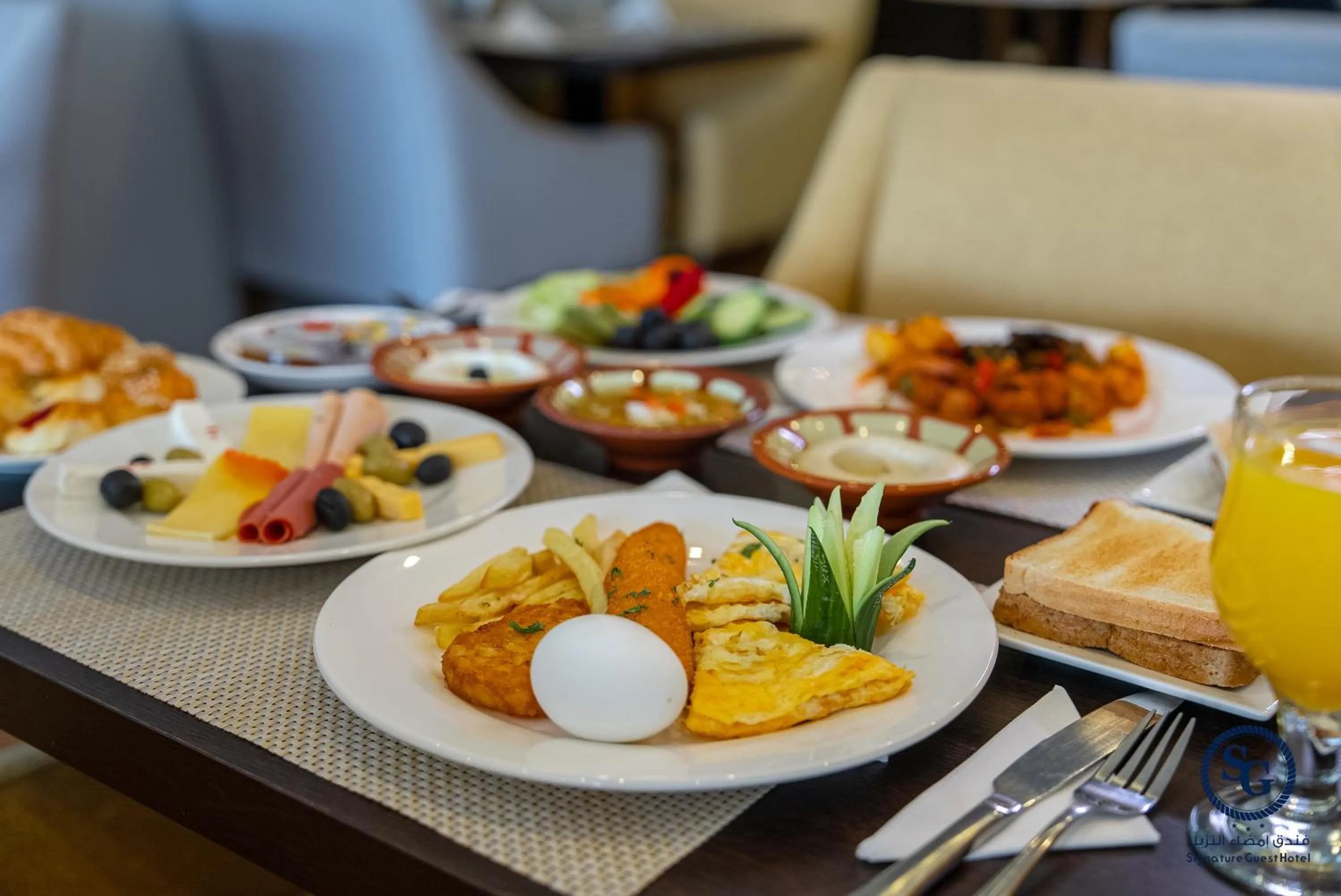 Breakfast in Signature Guest Hotel فندق إمضاء النزيل الفندقية