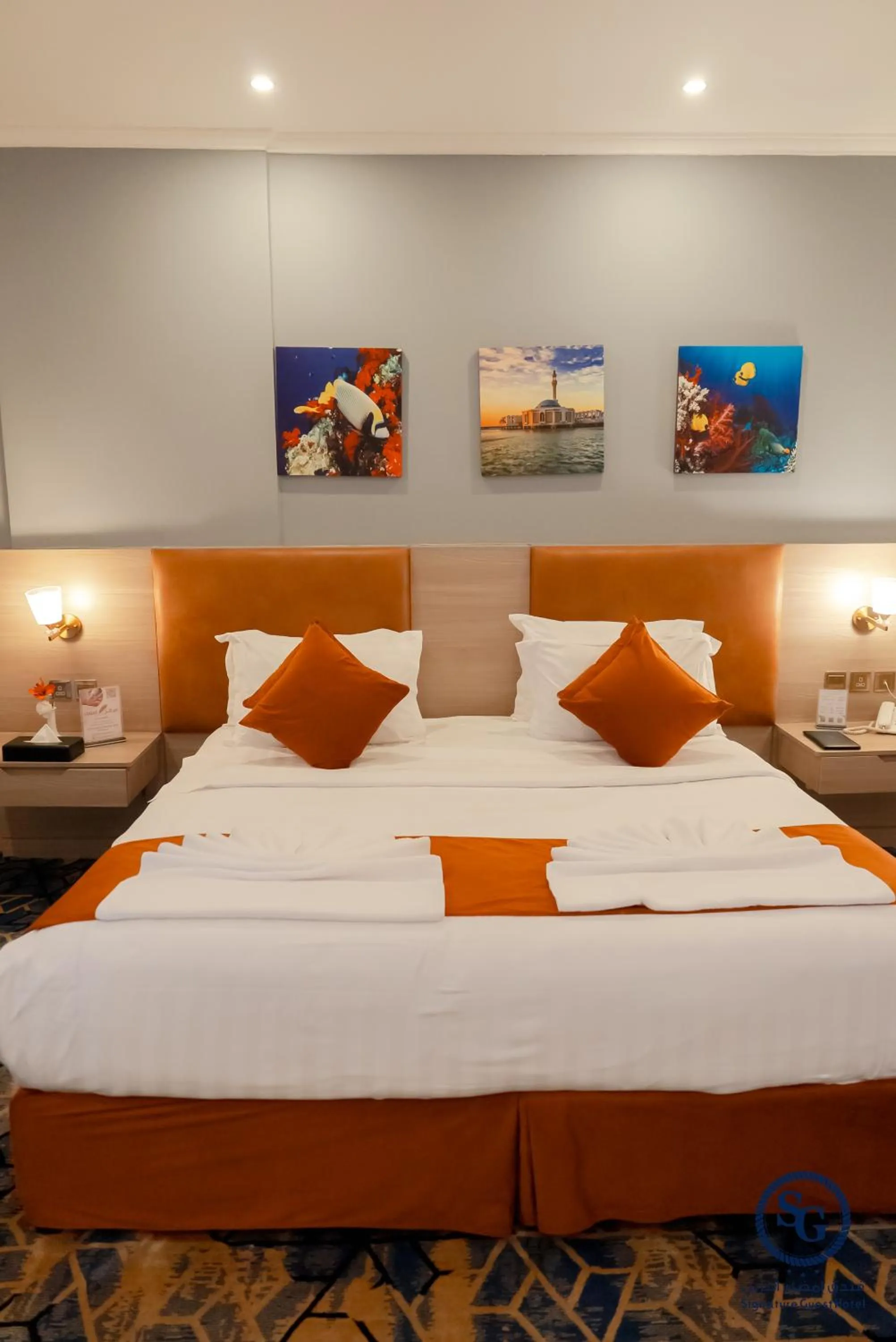 Bed in Signature Guest Hotel فندق إمضاء النزيل الفندقية