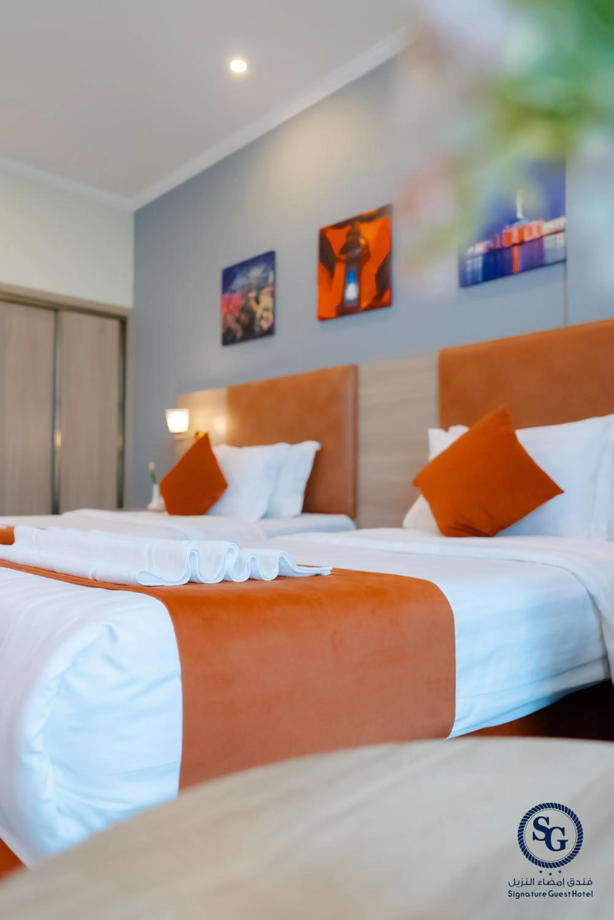 Bed in Signature Guest Hotel فندق إمضاء النزيل الفندقية