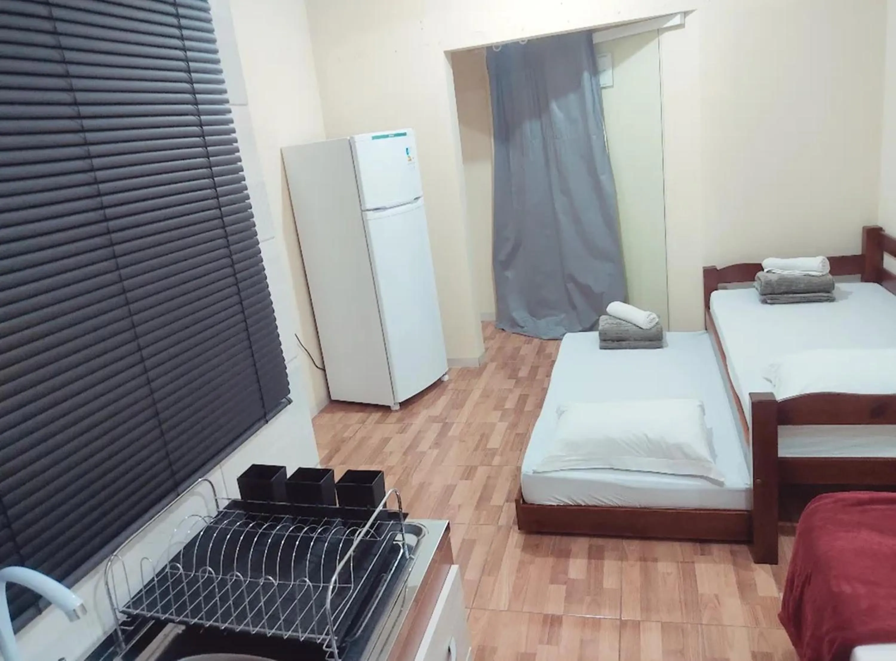 Bed in Pousada Helena