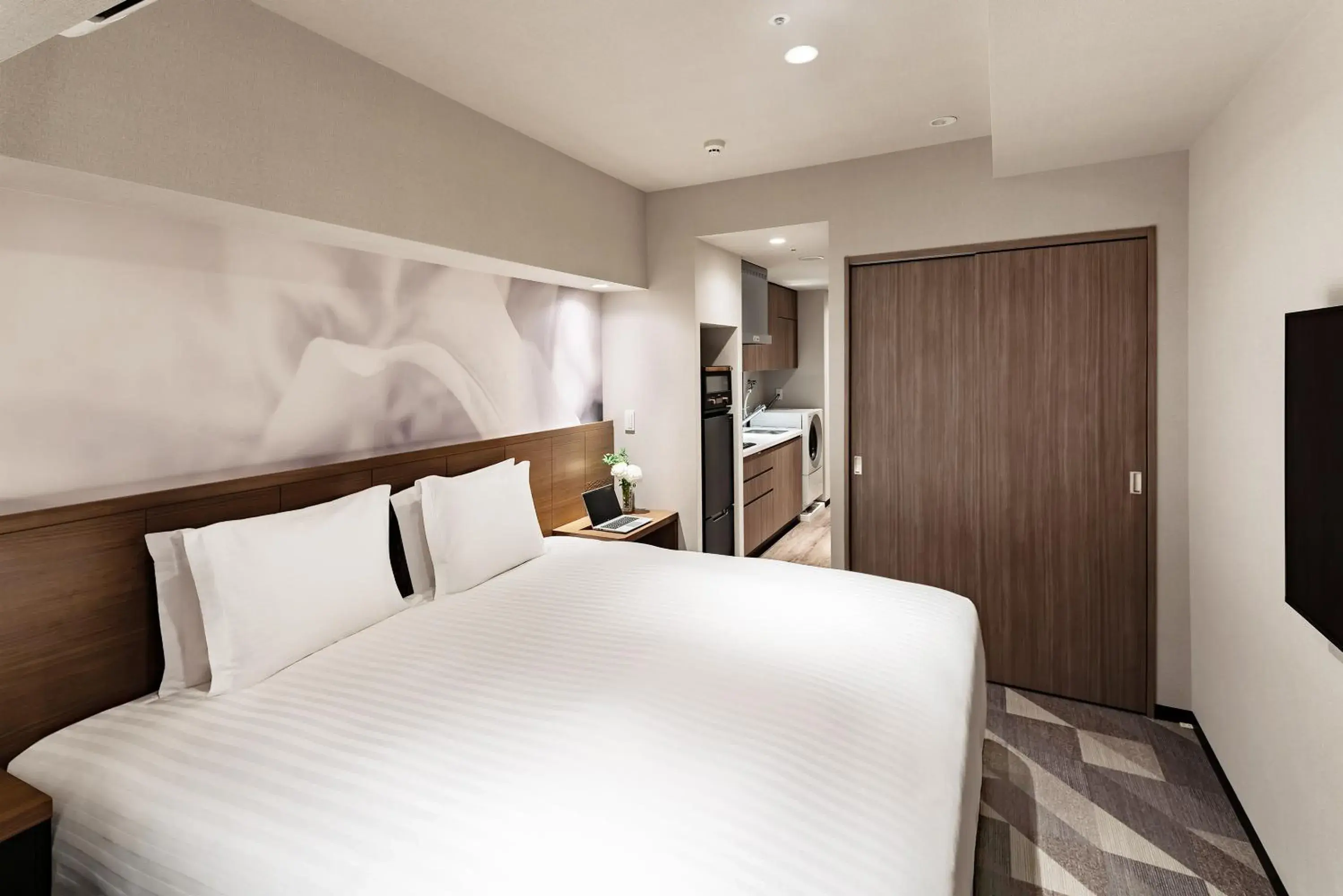 Bed in Oakwood Hotel & Apartments Azabu Tokyo Bed in Oakwood Hotel & Apartments Azabu Tokyo