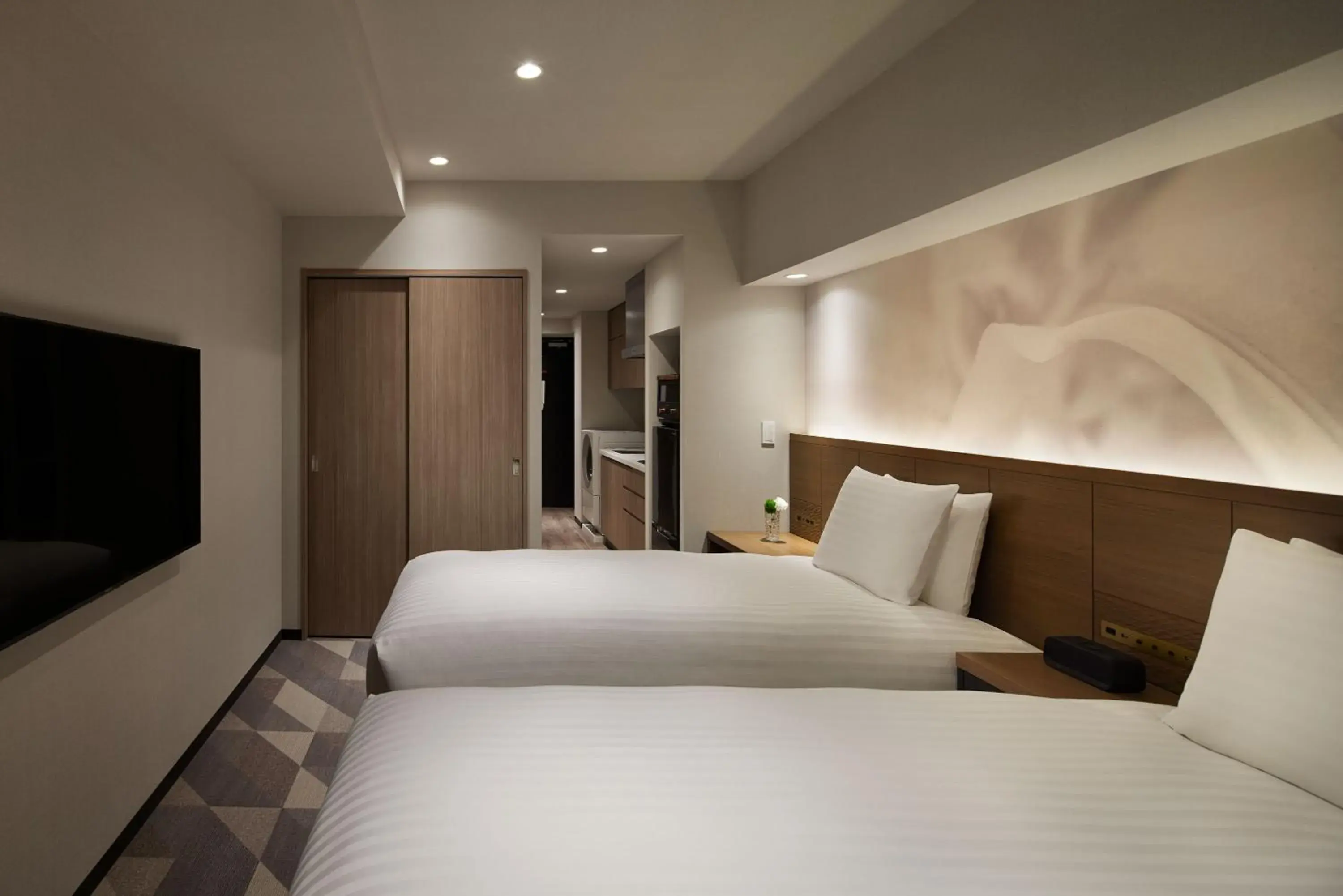 Bed in Oakwood Hotel & Apartments Azabu Tokyo Bed in Oakwood Hotel & Apartments Azabu Tokyo