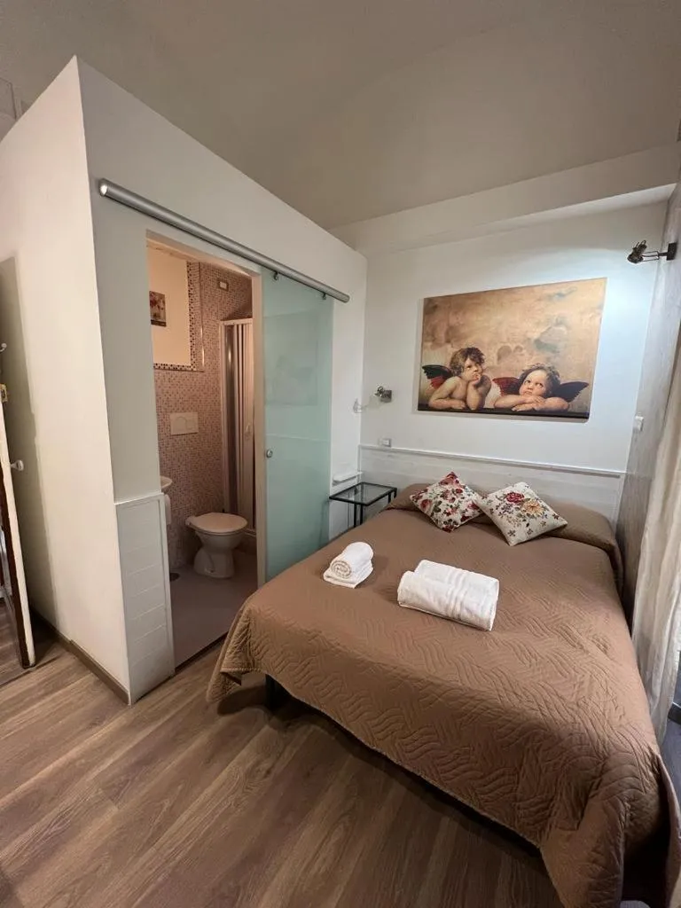 Bed in Marcelina vaticans rooms