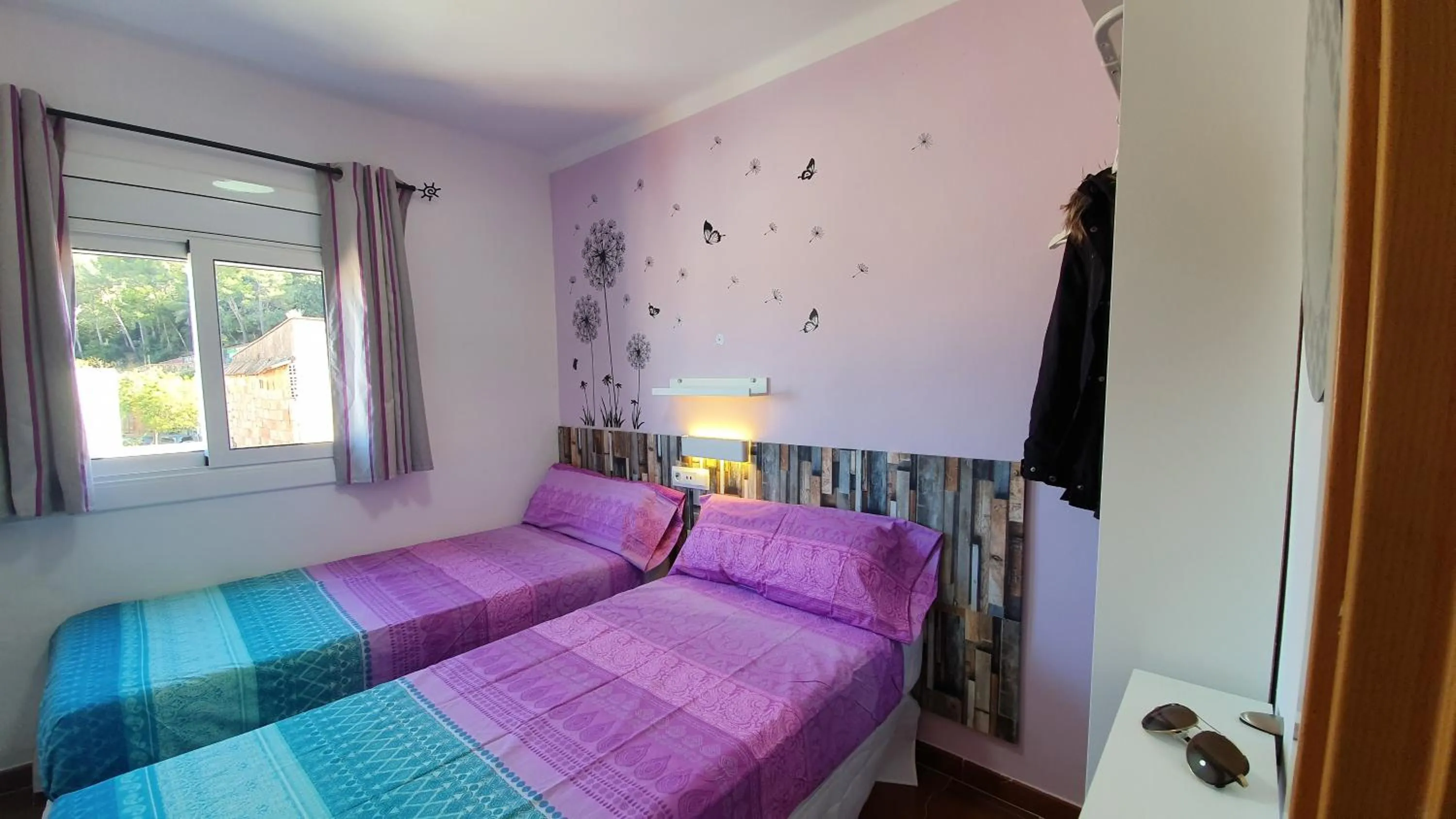 Bed in Ático, terraza y Barbacoa