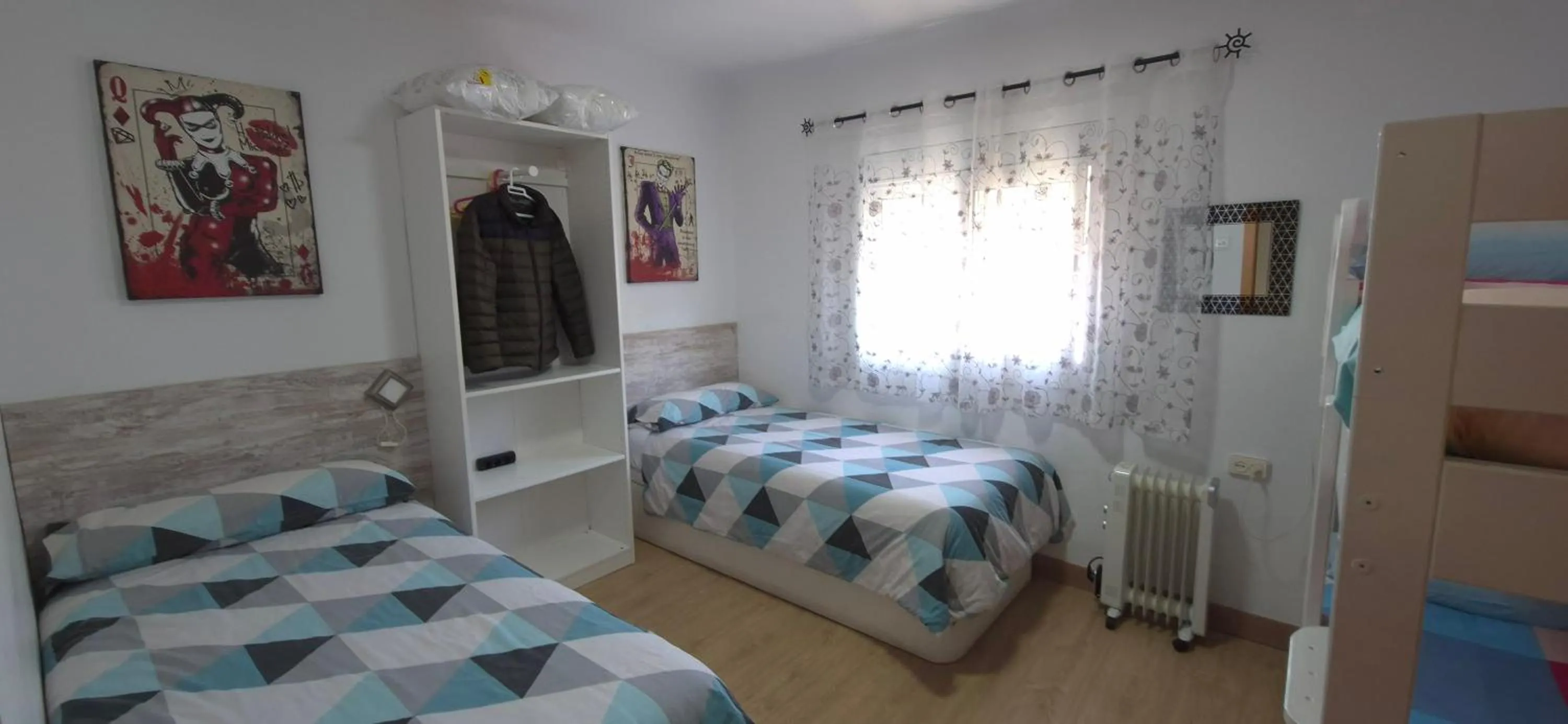 Photo of the whole room, Bed in Ático, terraza y Barbacoa