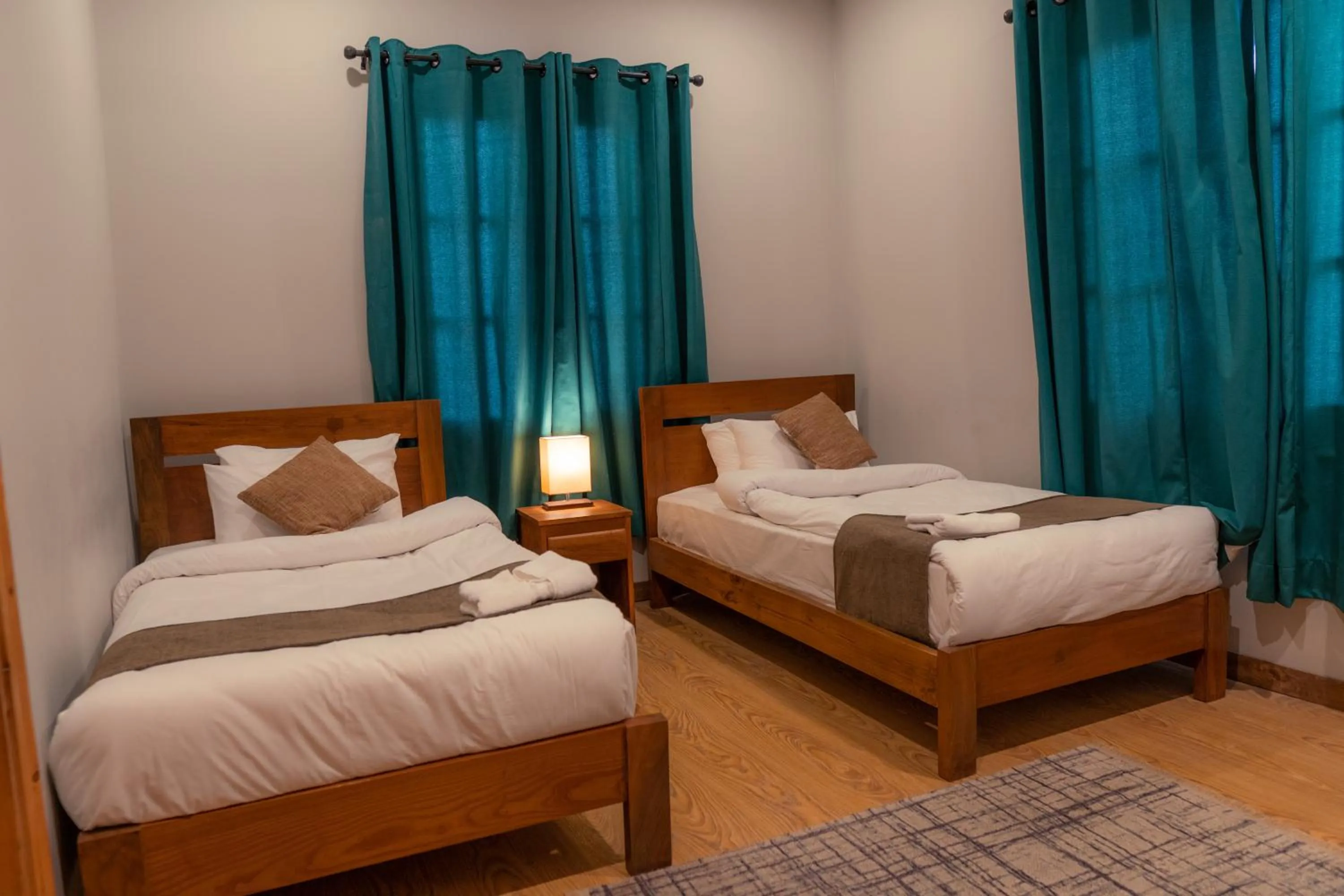 Bedroom, Bed in Dynasty Hotel Skardu