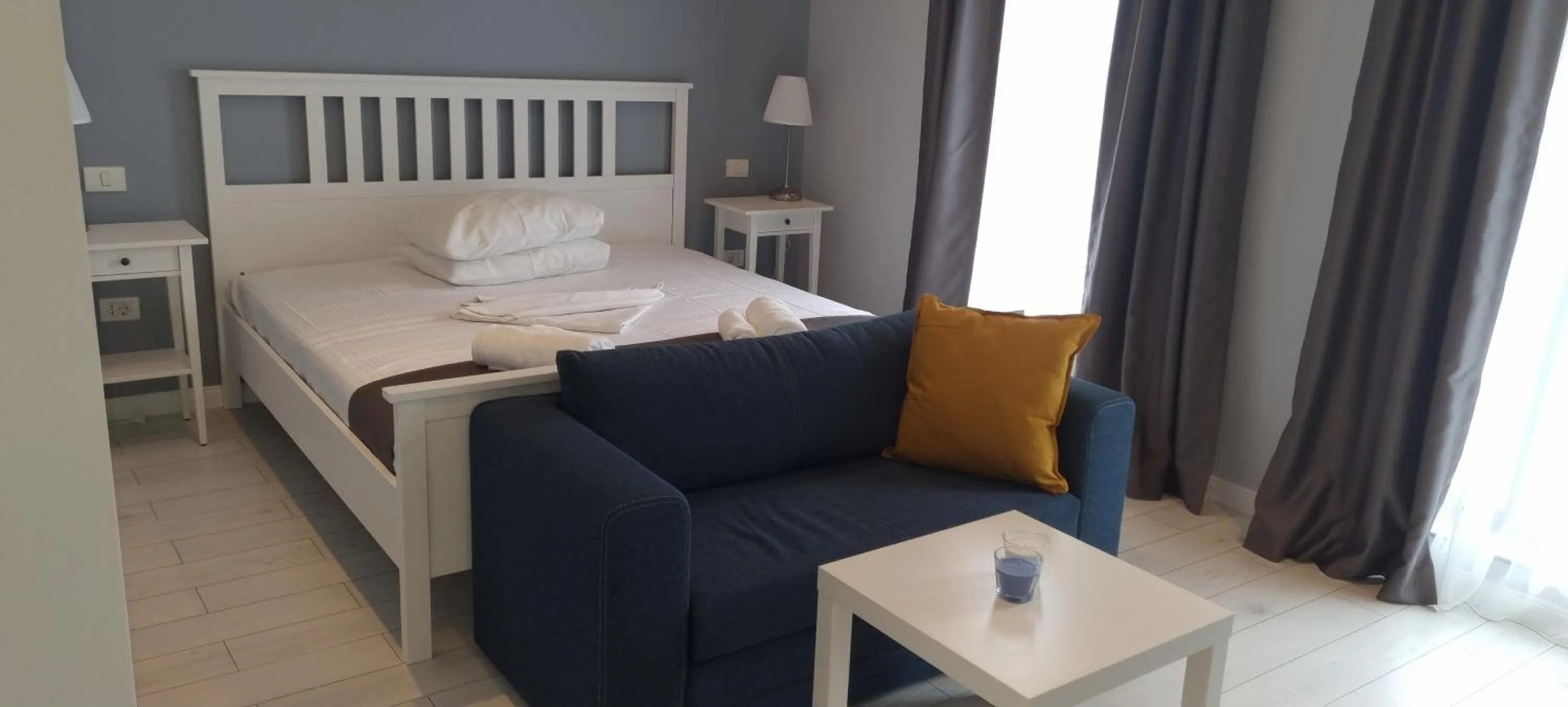 Photo of the whole room, Bed in CHG Boutique