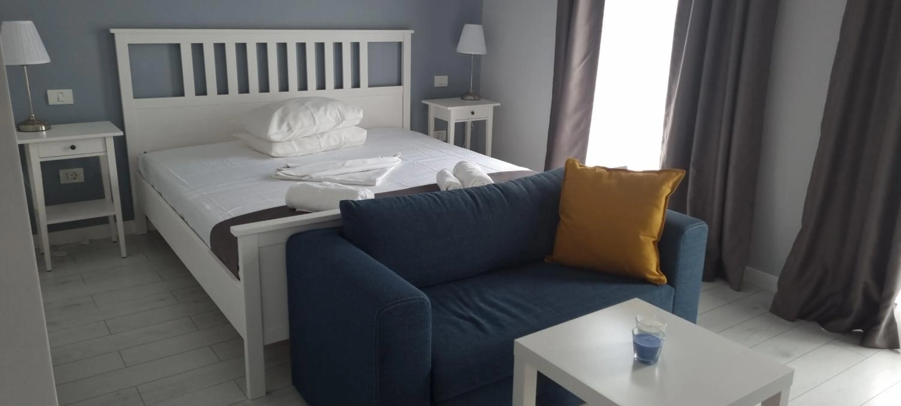 Photo of the whole room, Bed in CHG Boutique