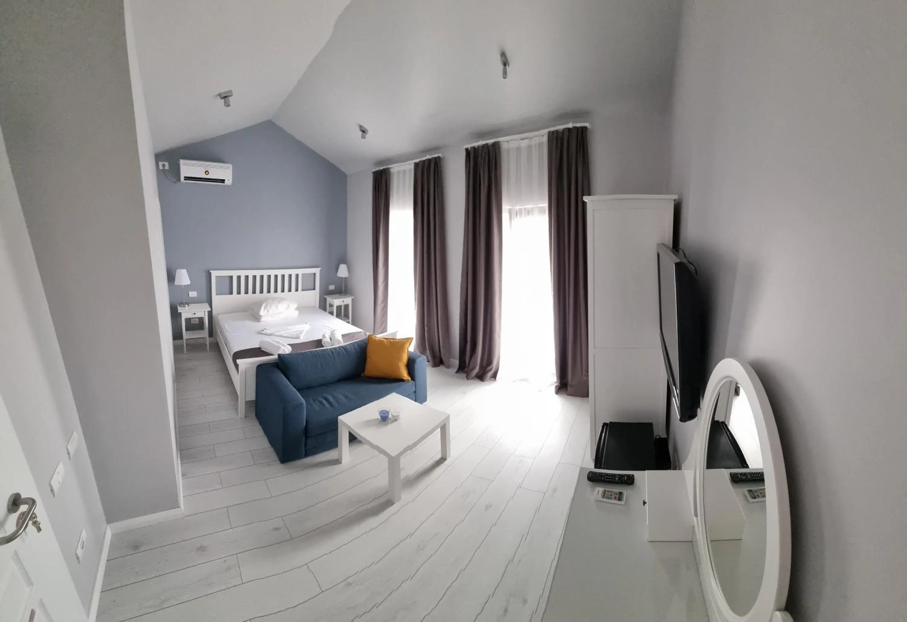 Photo of the whole room, Bed in CHG Boutique