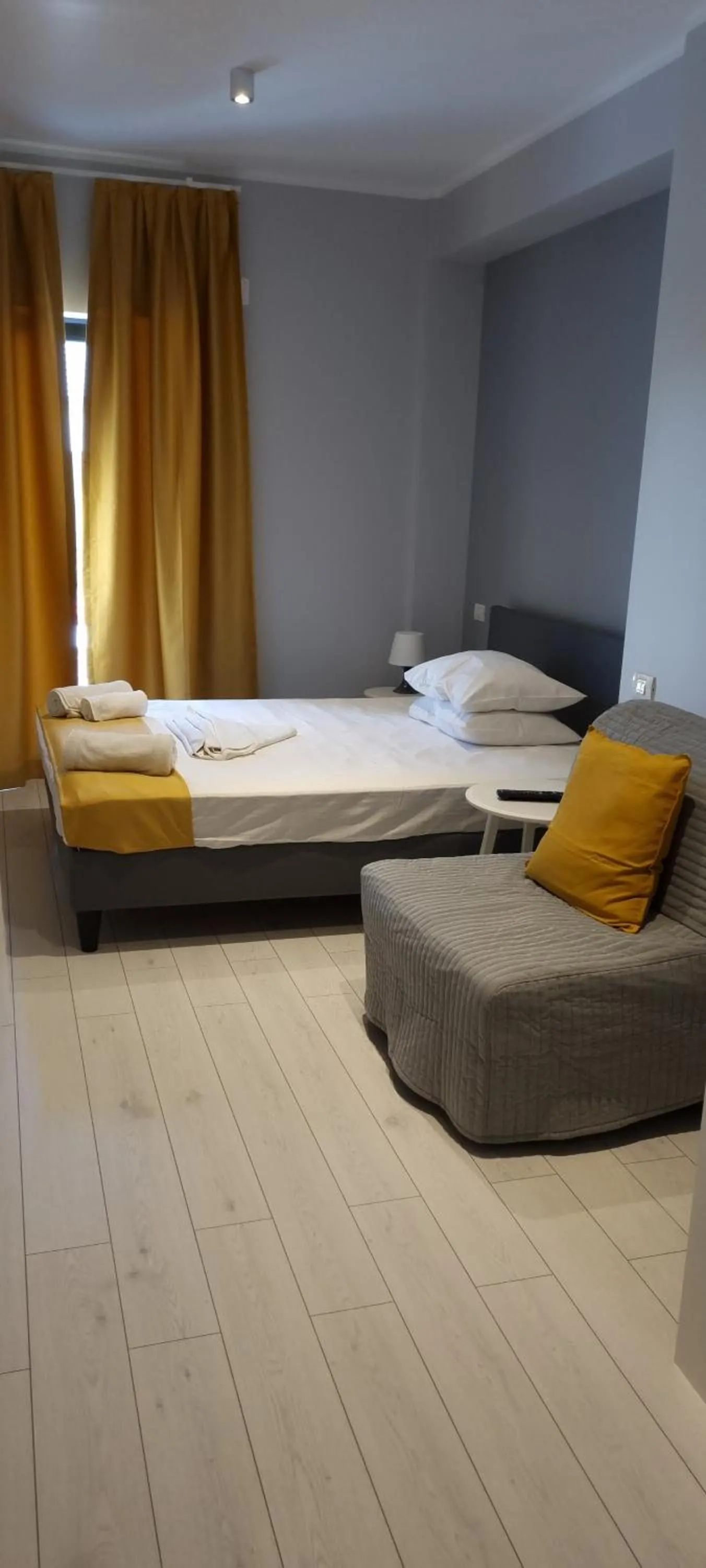 Photo of the whole room, Bed in CHG Boutique