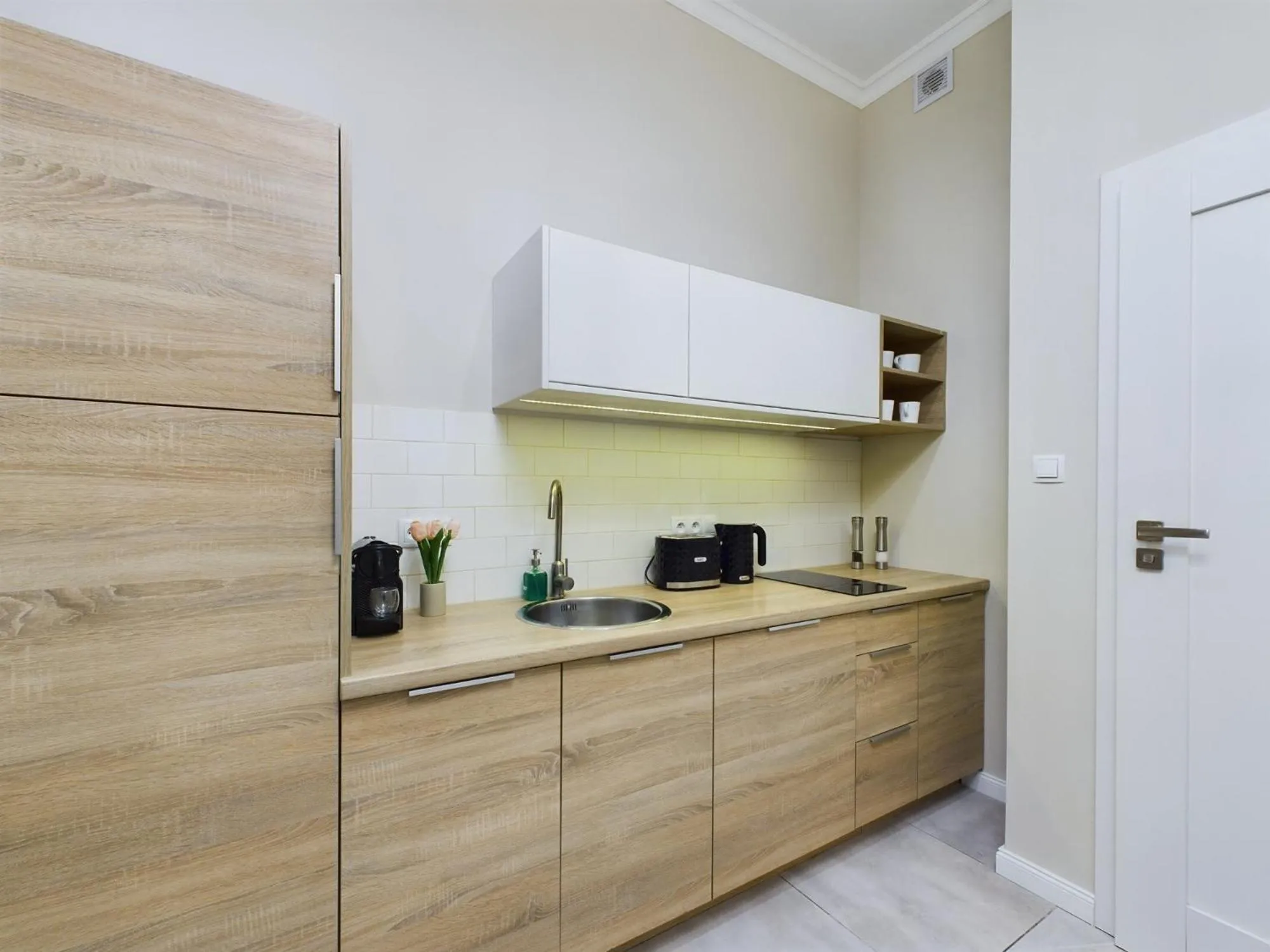 Kitchen or kitchenette in Apartments Dietla Cracow by Noclegi Renters