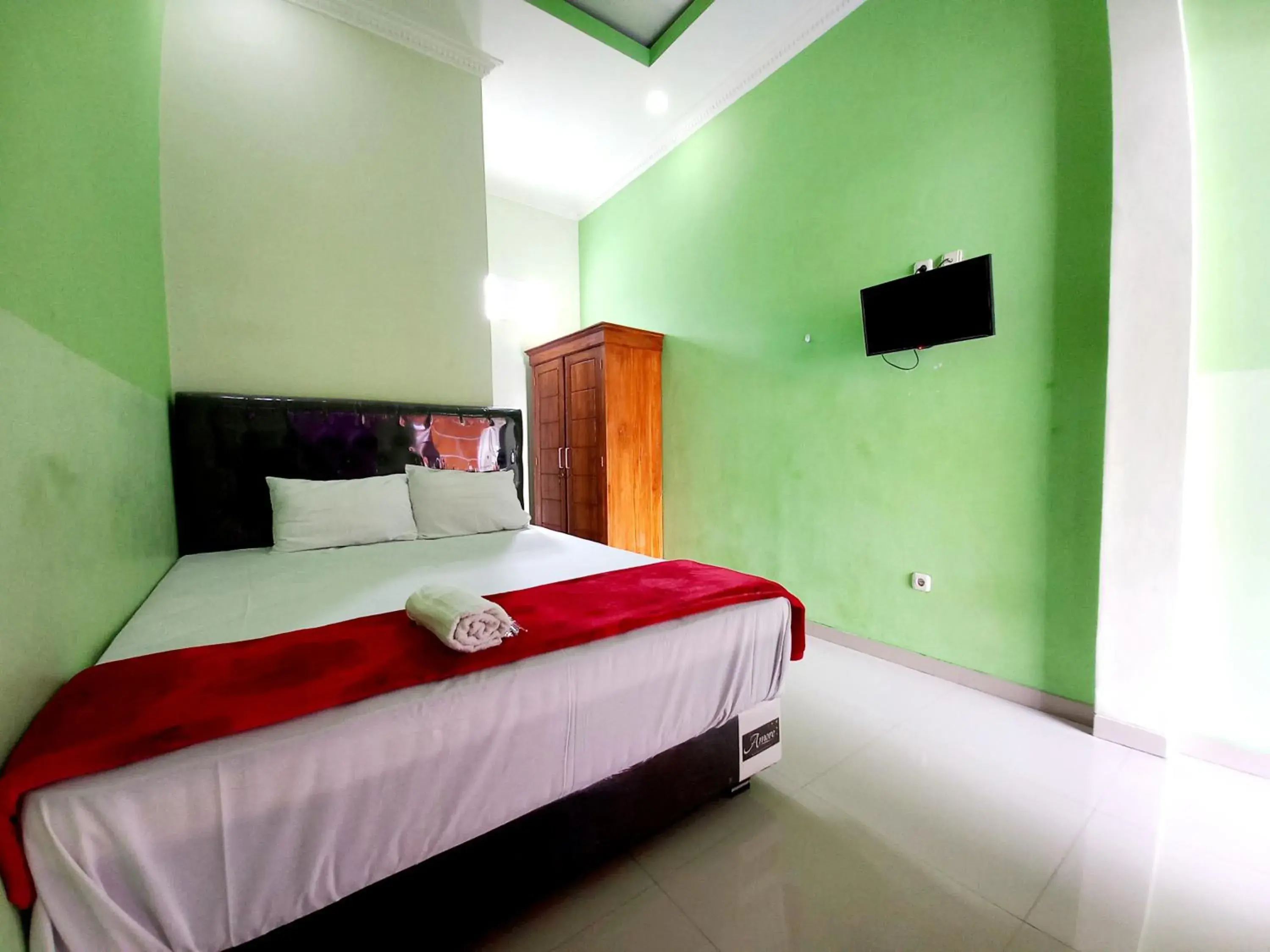 Bed in Harmony House Syariah near Alun Alun Pati Mitra RedDoorz Bed in Harmony House Syariah near Alun Alun Pati Mitra RedDoorz